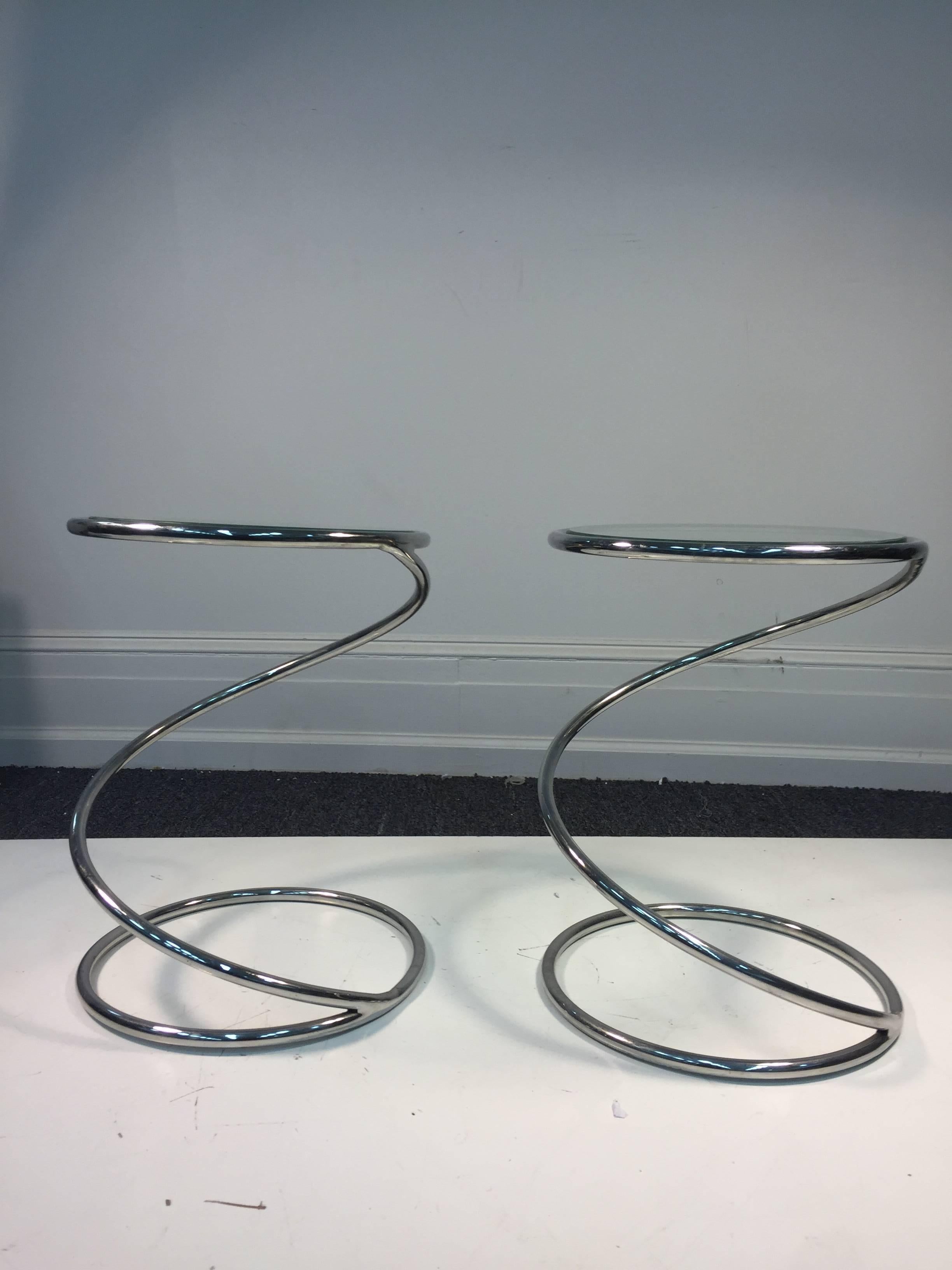 A magnificent pair of modernist, chrome, spiral side tables with circular glass tops 1970,s 