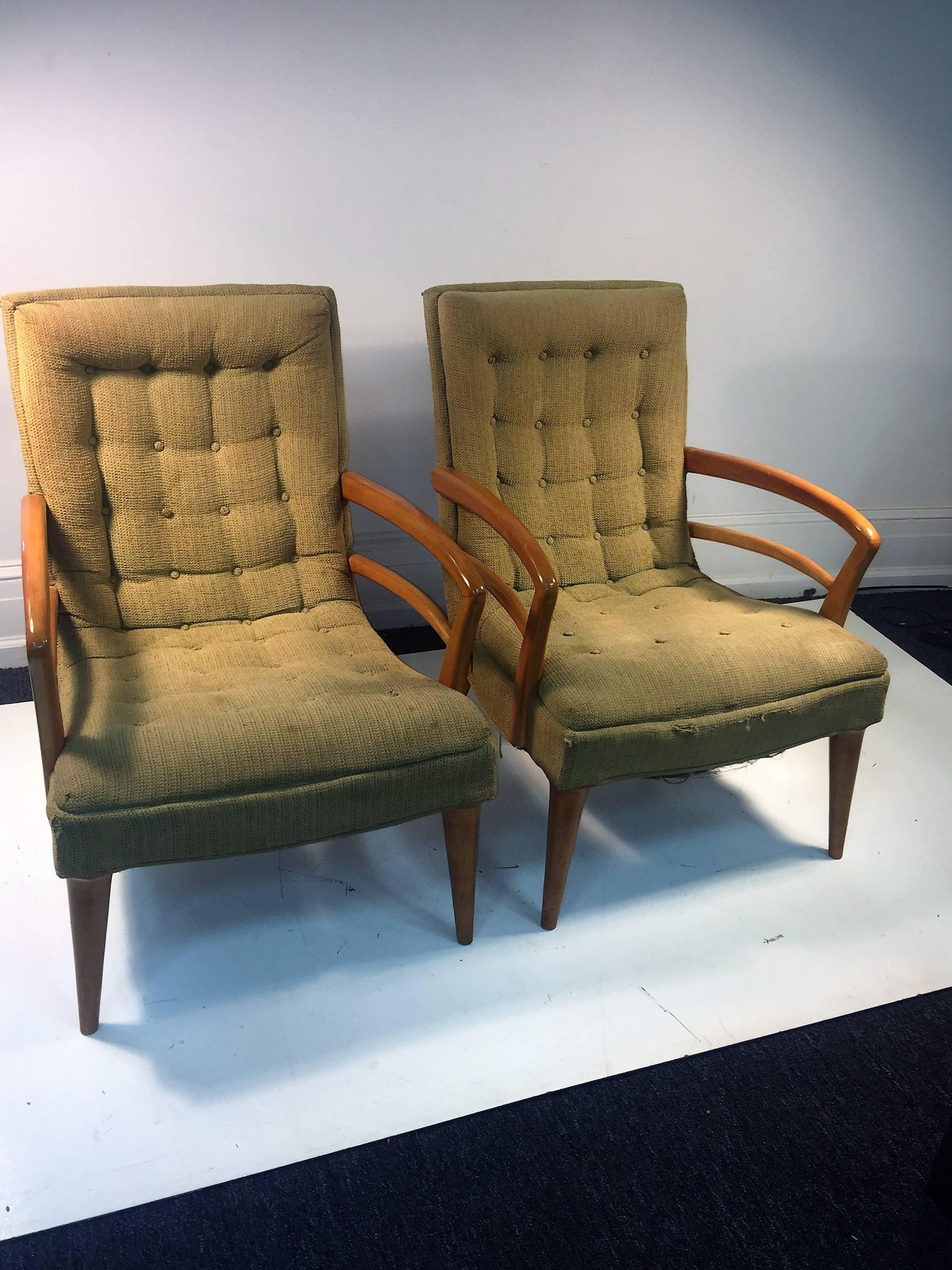 Pair of armchairs designed by Kem Weber circa 1940s with original upholstery.
Wonderful tufted design that can be reupholstered in a great fabric. These chairs would suit many interiors be it Art Deco or Mid-Century. Great double handled bentwood