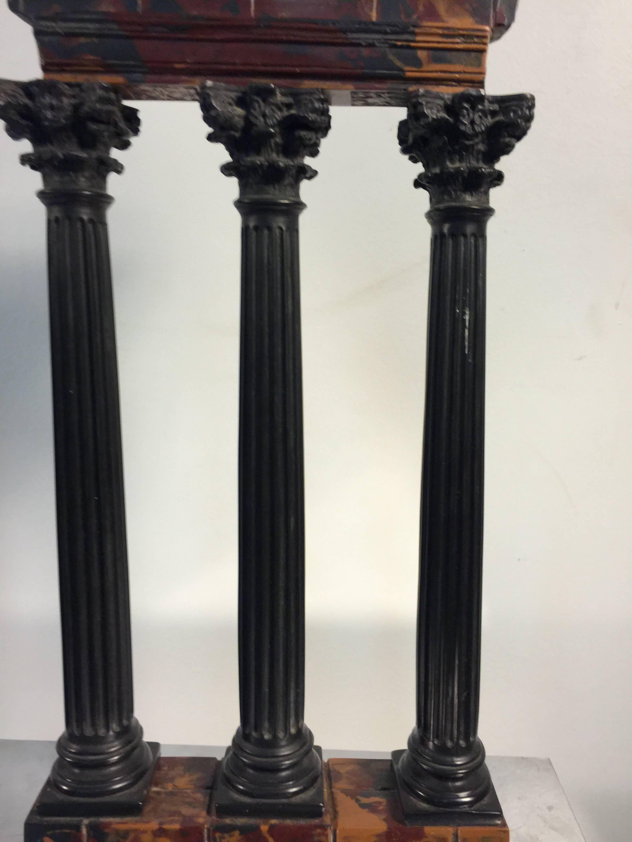 A set of two Roman style Grand Tour models or sculptures of ancient temple ruins; columns with fluted bodies and elaborate Corinthian capitals.

Larger 20 H x 9 W x 2 D.
Smaller 17 H x 8 W x 2 D.

 