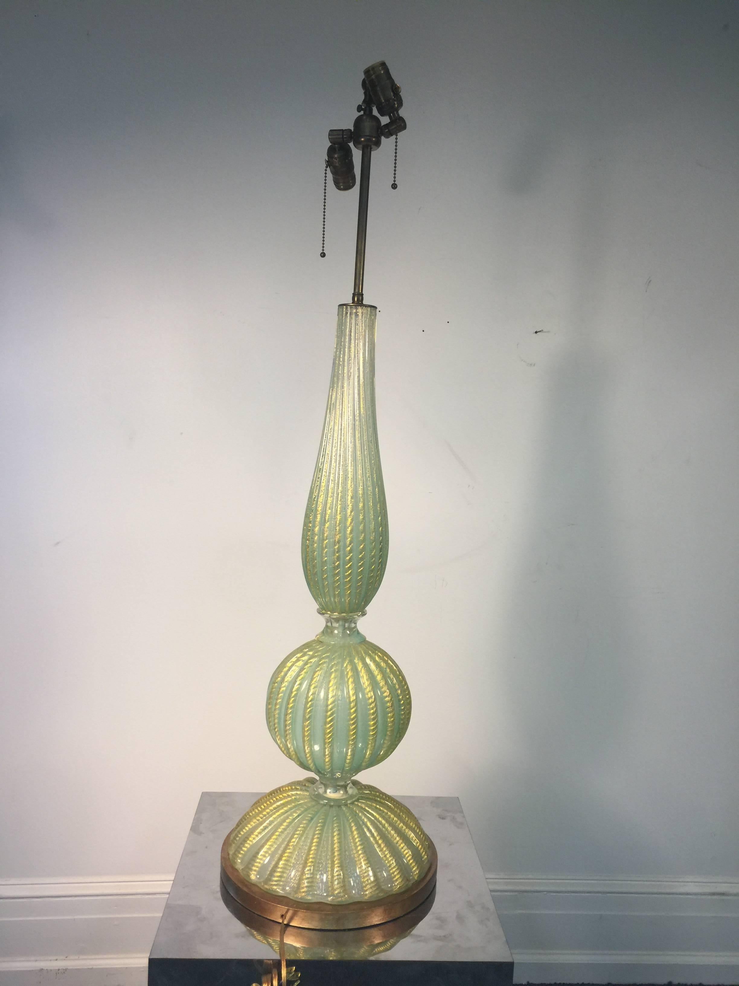 A beautiful Barovier & Toso Murano glass Cordonato d'Oro aquamarine table lamp with gold flecks between ribs, circa 1960.