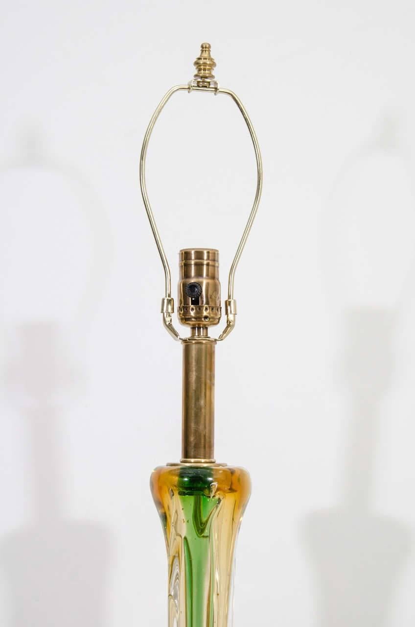 A beautiful pair of Cenedese table lamps in yellow, clear and green swirl Murano glass, circa 1950.