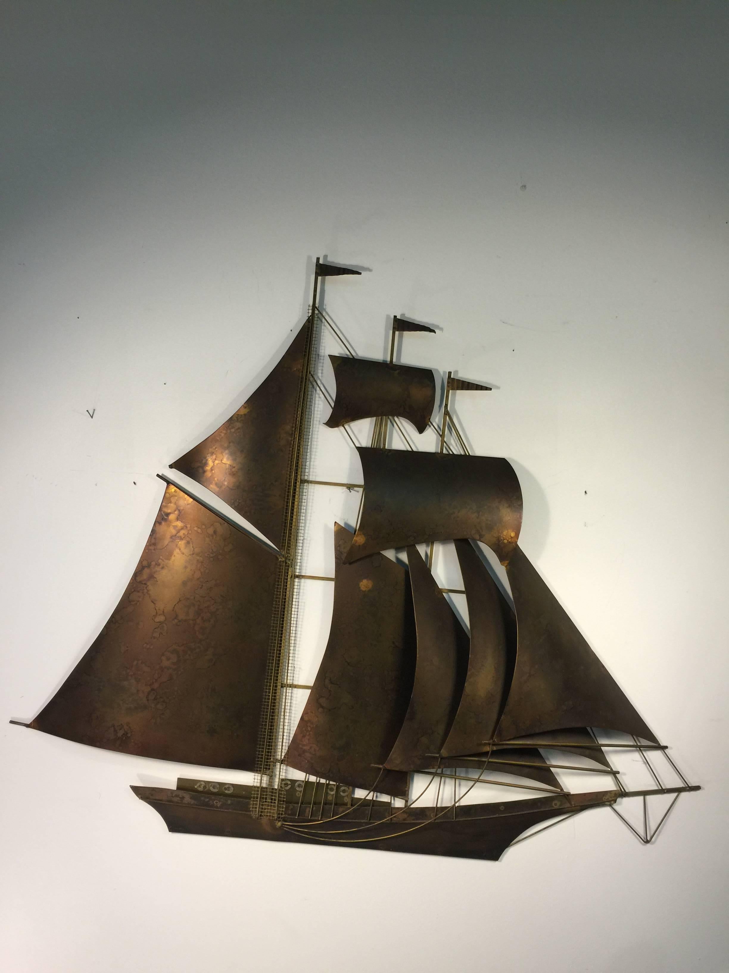 A Brutalist Monumental Burnished Copper Ship by Curtis Jere created in the 1970's.Large Scale with Nautical Modern Appeal To add drama to your Wall.