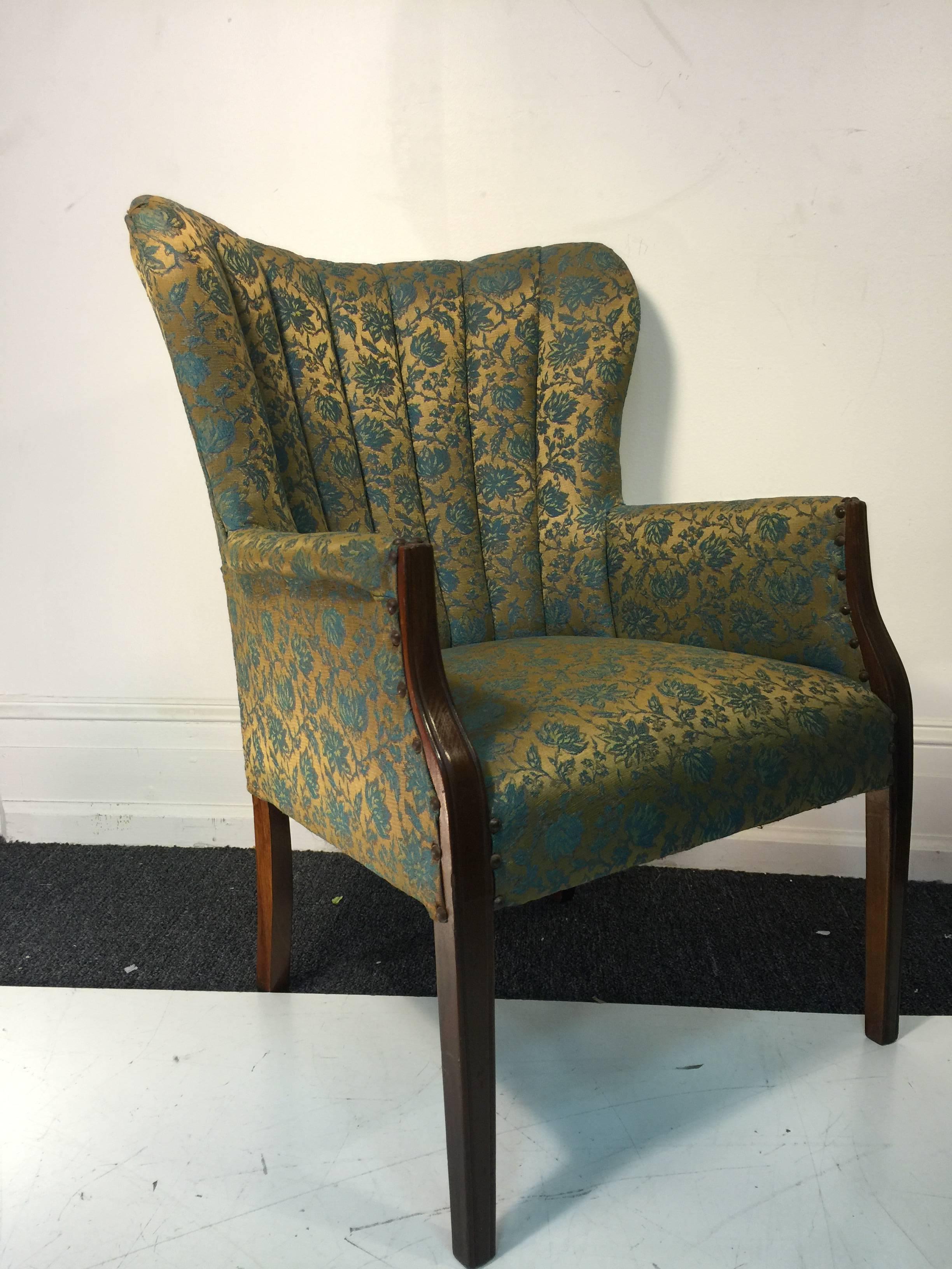 An Elegant Hollywood Regency pair of Dorothy Draper style fan back armchairs in the Original Gold & Aqua Blue Lame` Floral upholstery, circa 1940.