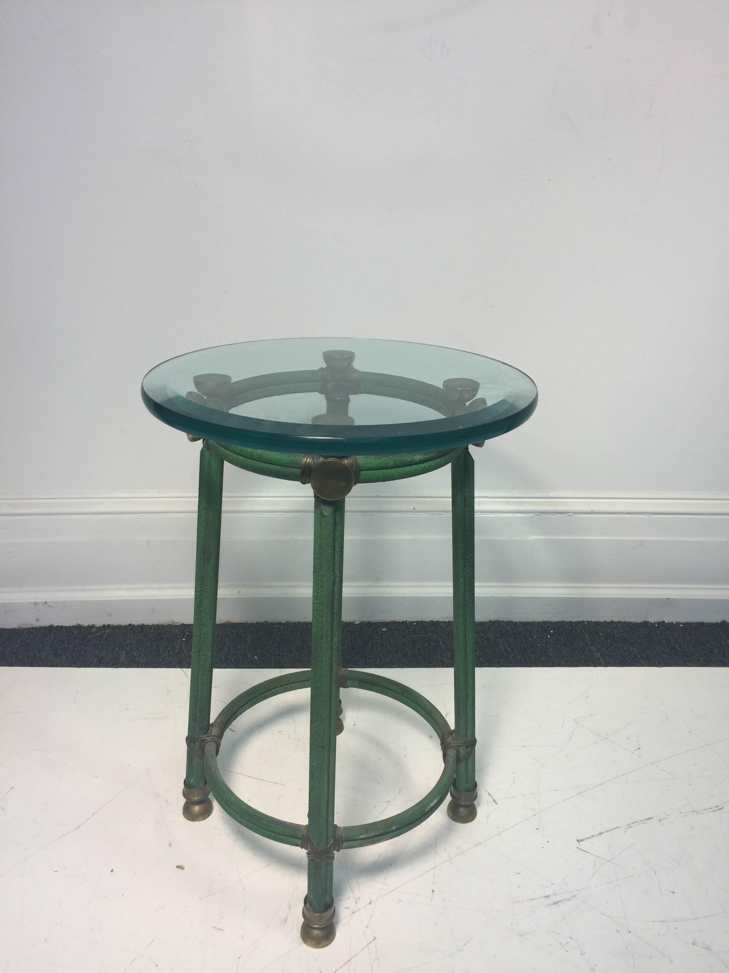 A great side brass and iron side or accent table in the manner of Gucci, circa 1970.
