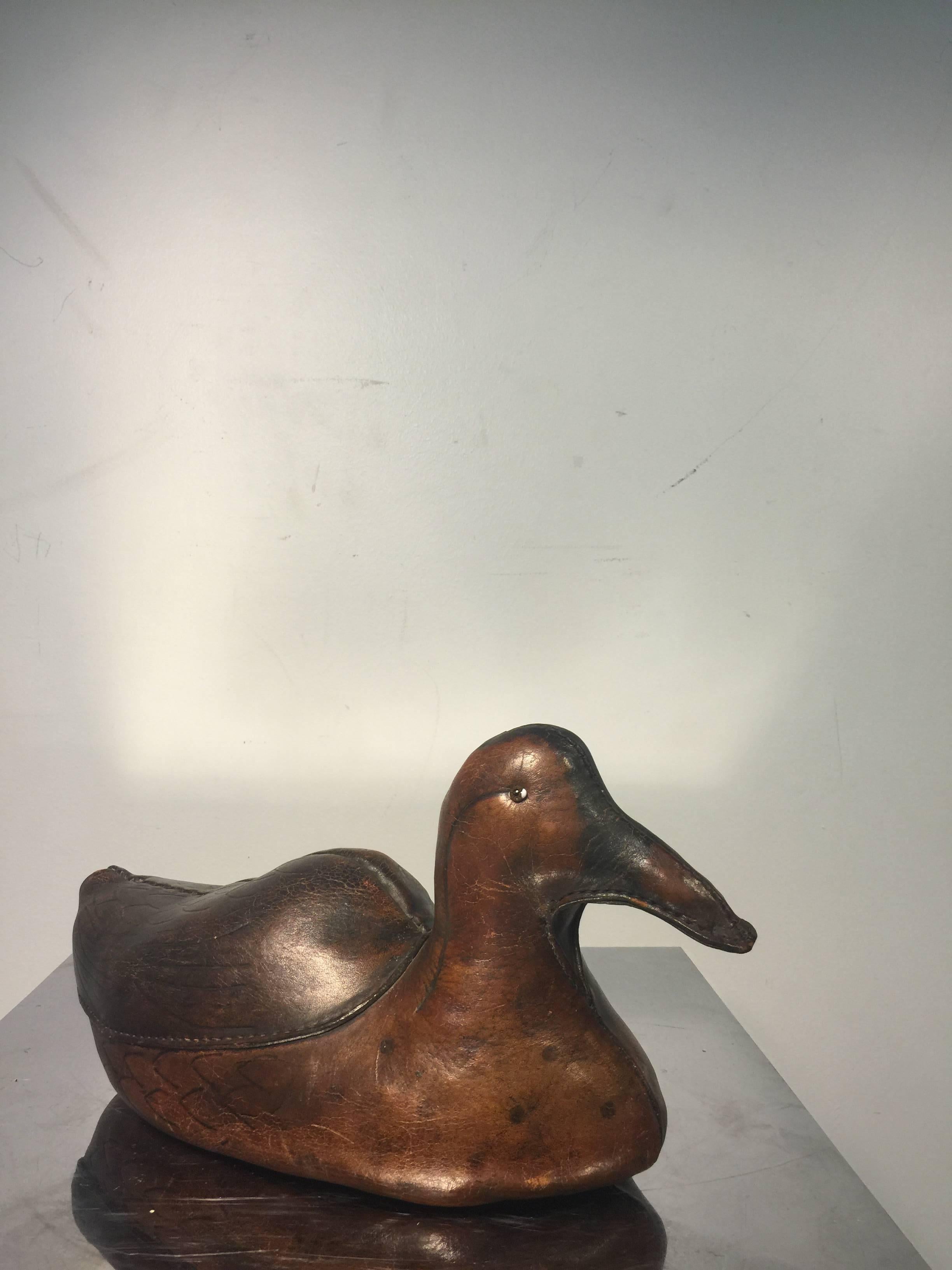 An amazing sculptural leather duck by Abercrombie and Fitch, circa 1950.