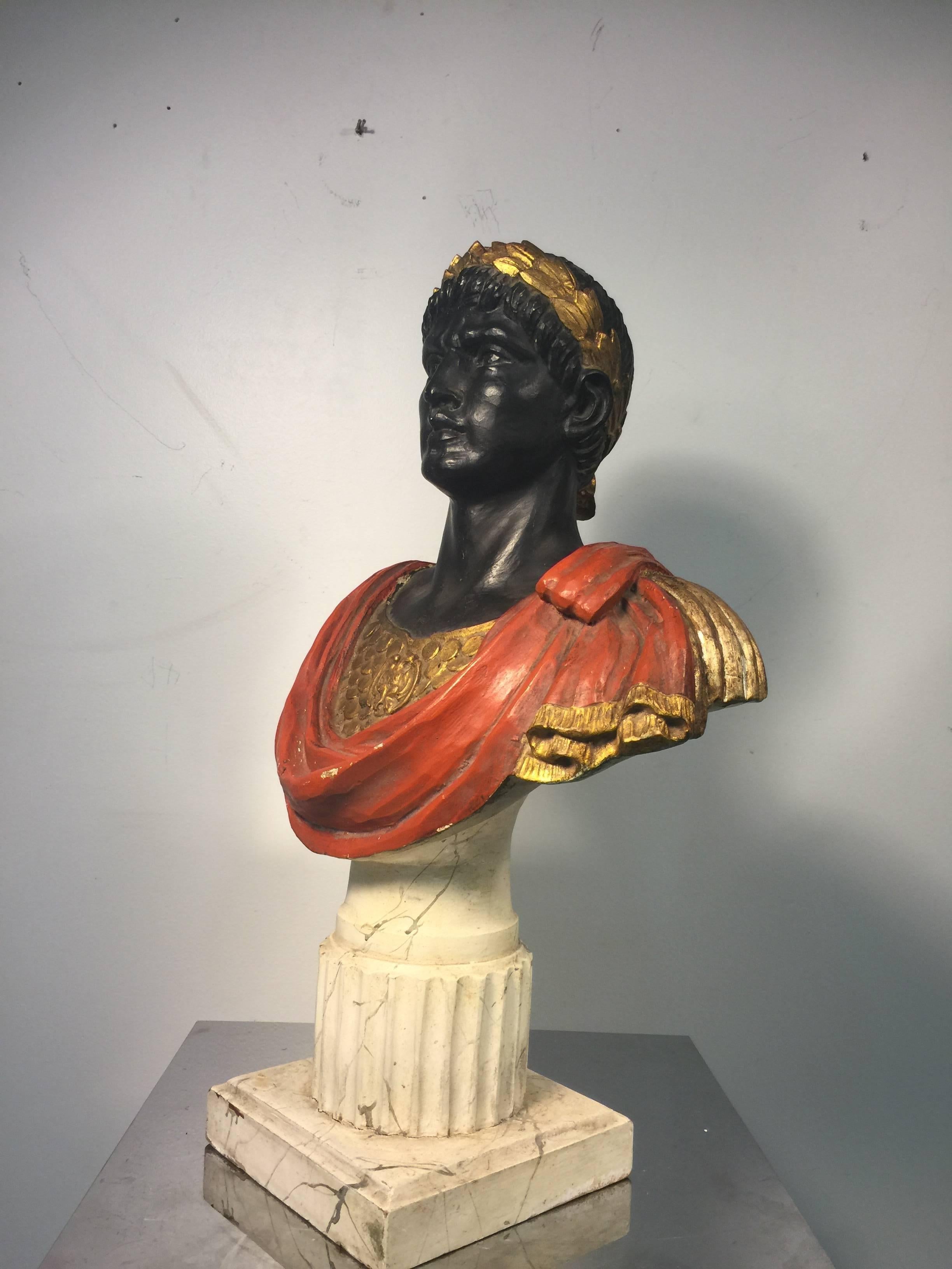 A handsome hand-carved and painted bust of Julius Caesar, Emperor of Rome.