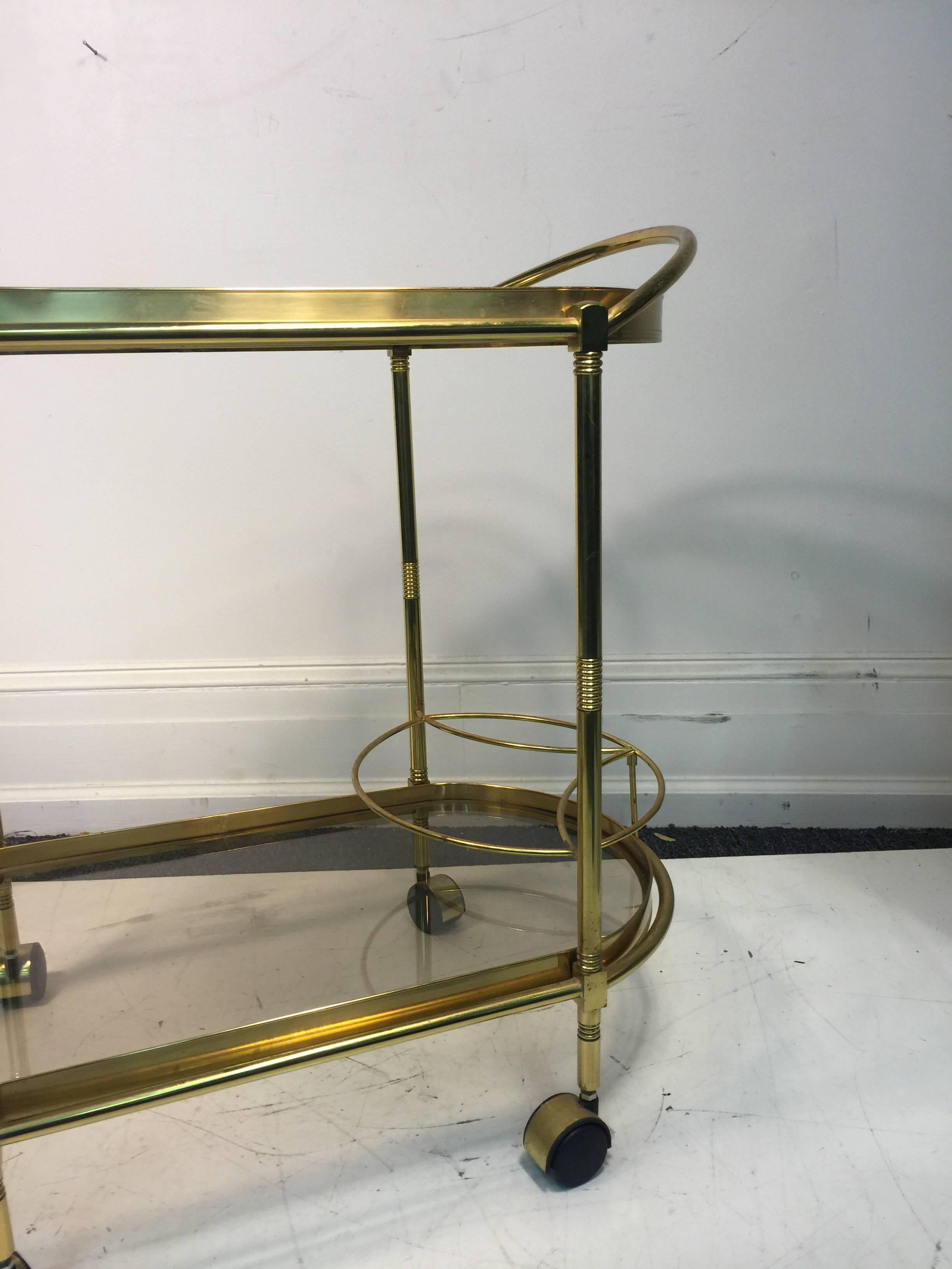 Sensational Oval Shaped Two-Tier Brass Italian Tea or Bar Cart In Good Condition For Sale In Mount Penn, PA