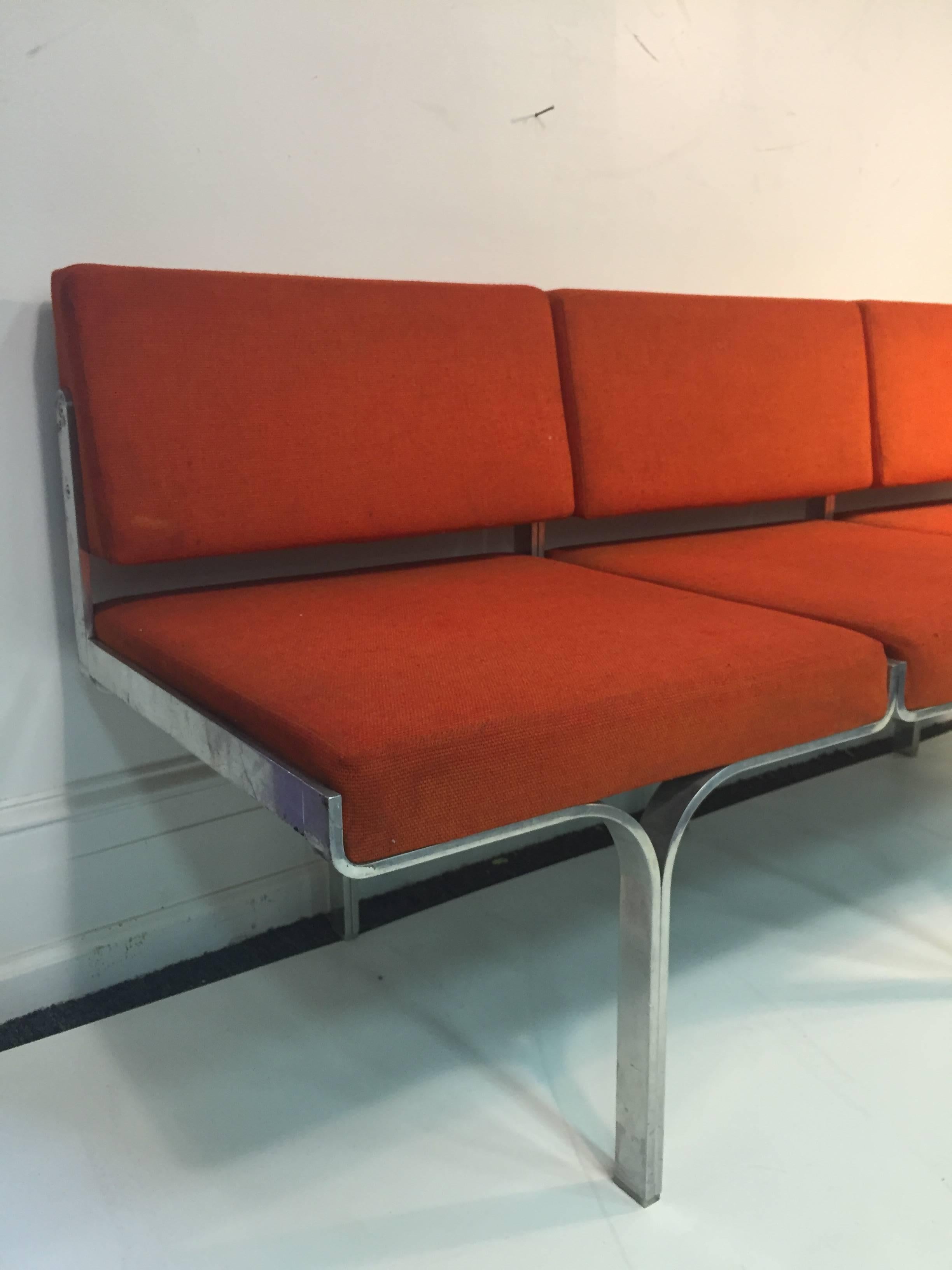 A fabulous Erwine and Estelle Laverne bright orange and three-seat bench for Laverne Originals, circa 1960.