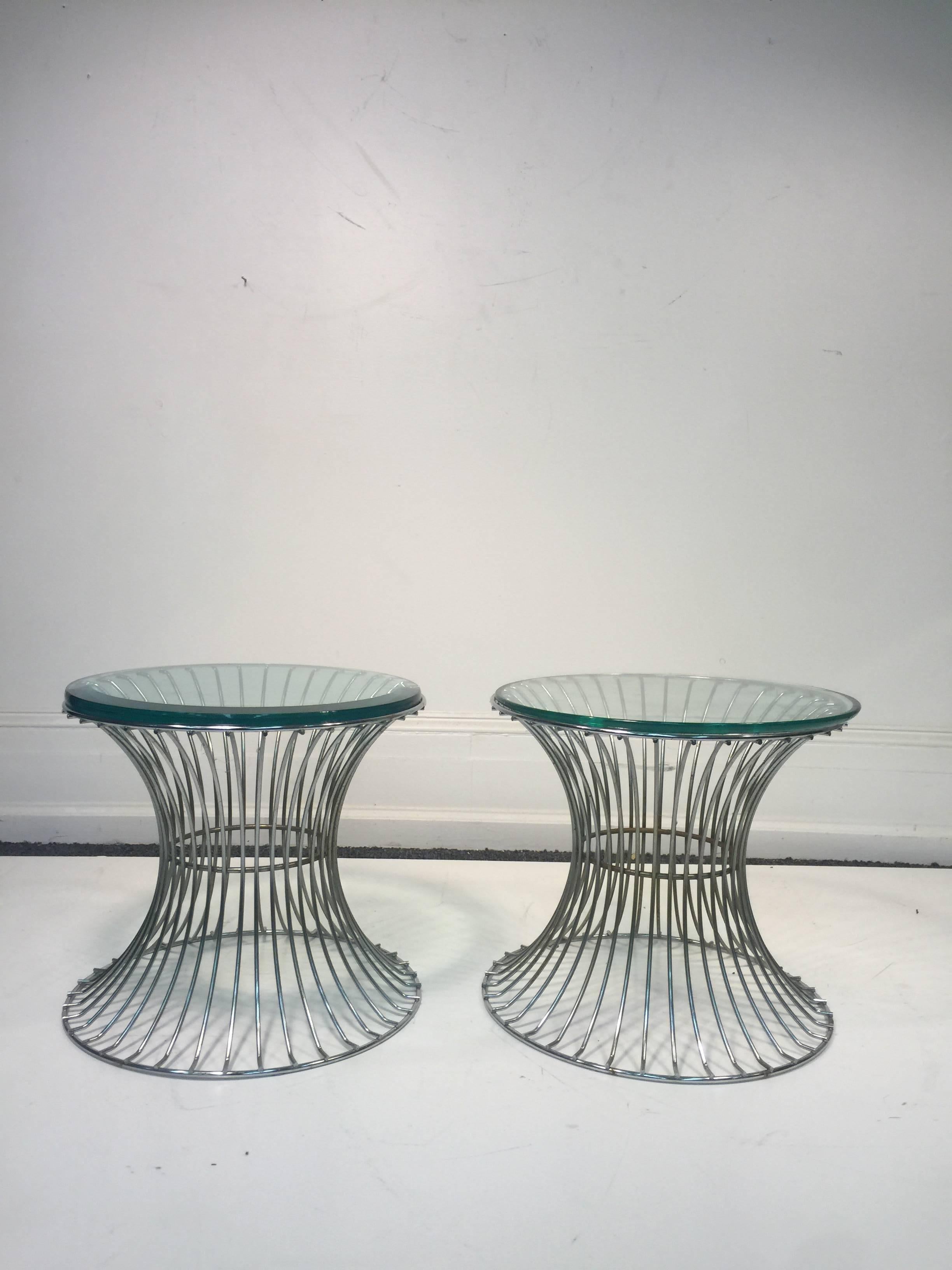 A wonderful pair of end or side tables with trumpeting wire bases by Warren Platner for Knoll. Unusual size, circa 1960. Good condition with age appropriate wear.