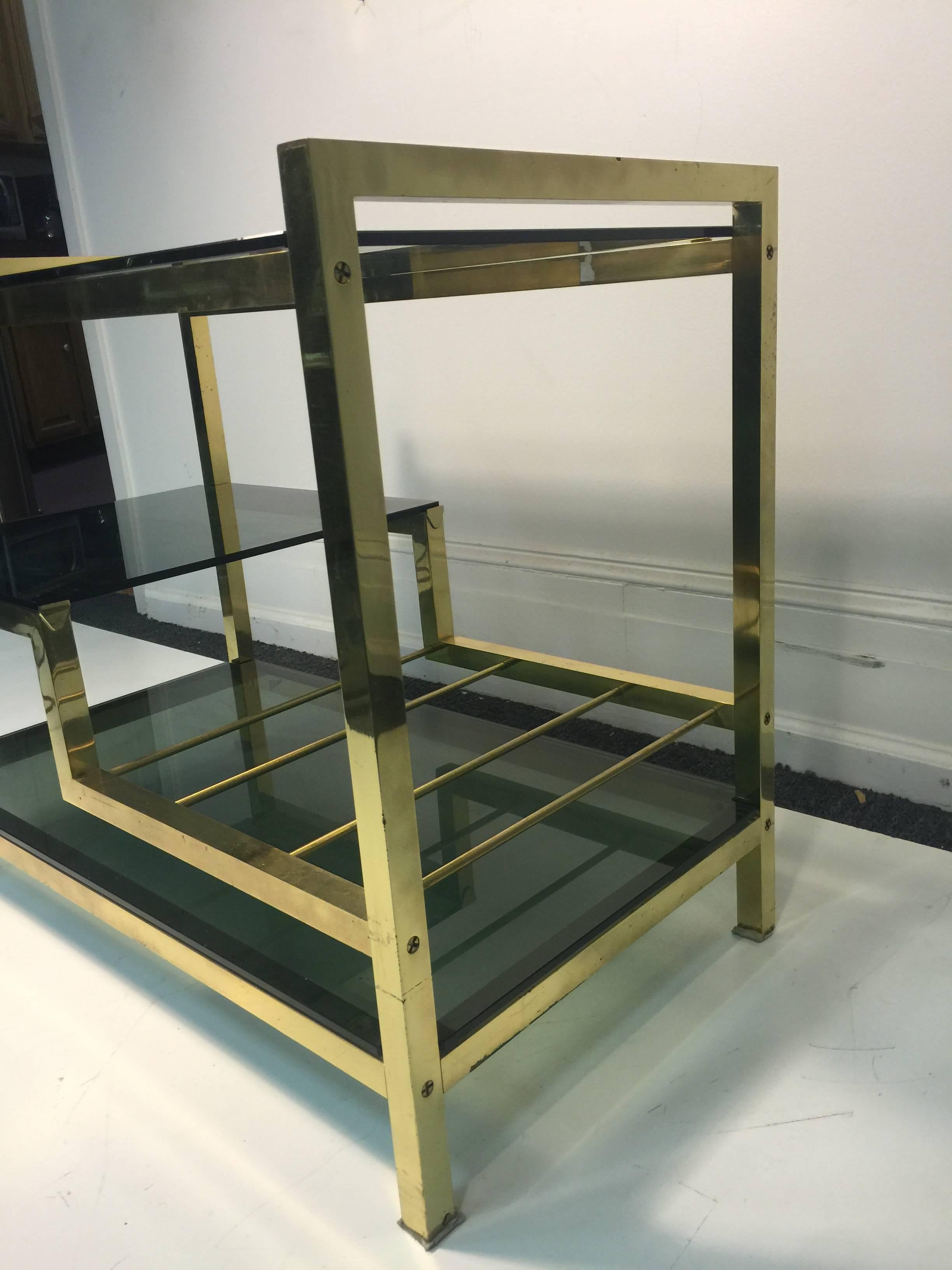 Incredible Italian Modernistic Brass Bar Cart with Smoke Glass Shelves For Sale 5