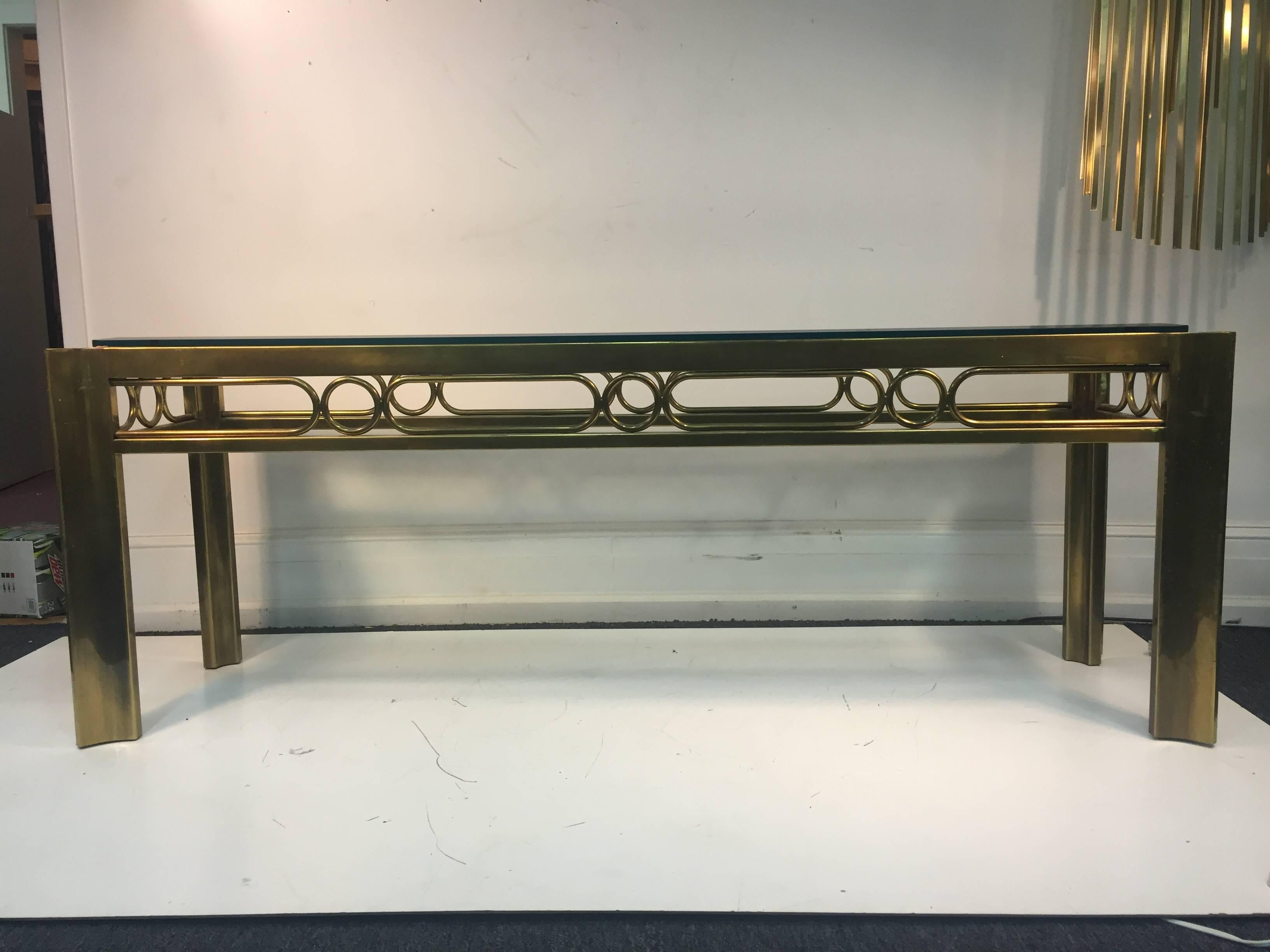 A terrific brass and mixed-metal console table with unusual design by Mastercraft, circa 1970. Good vintage condition with age appropriate wear.
 