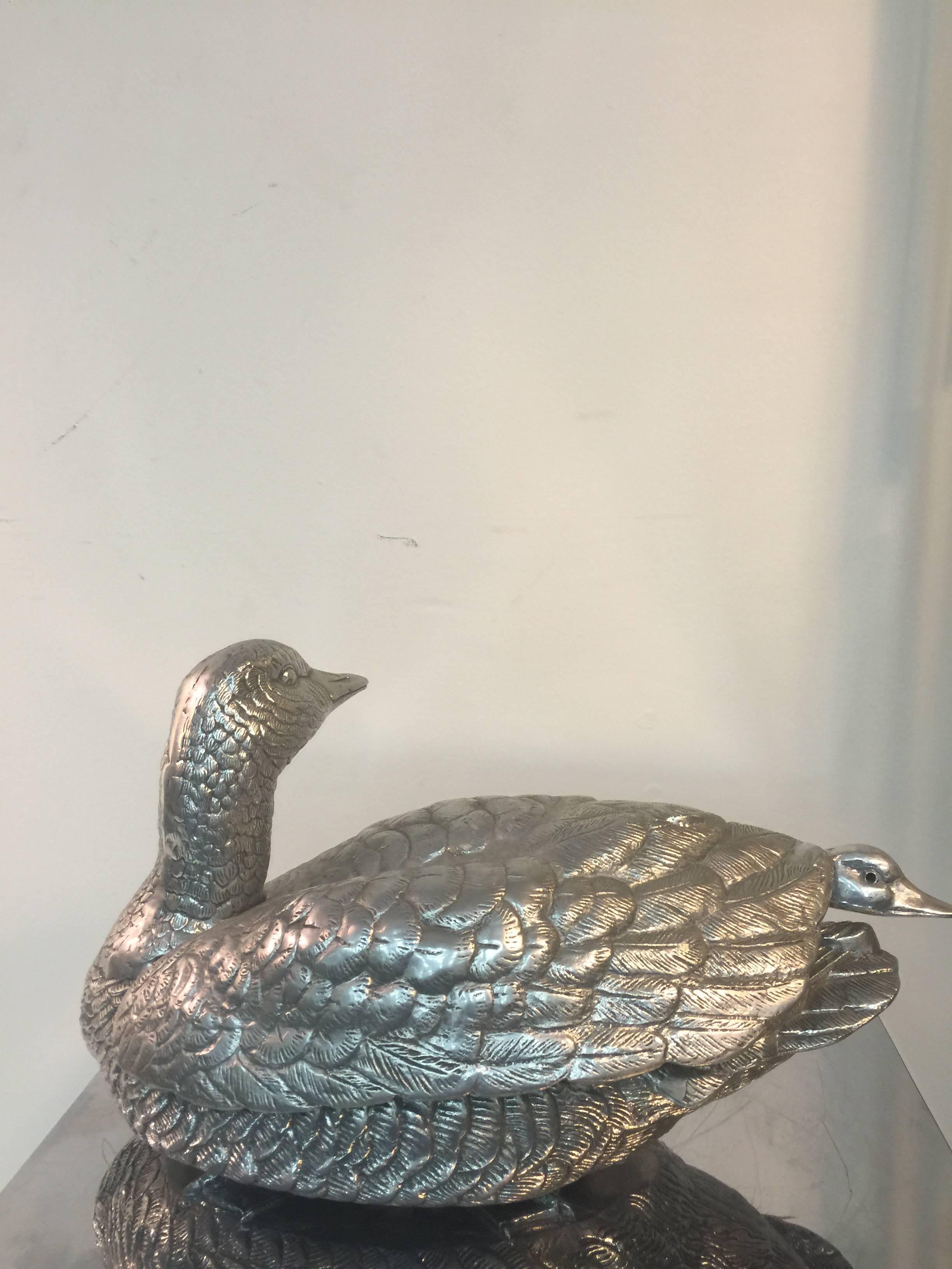 A terrific covered tureen in the shape of a duck with aluminum ladle by Arthur Court, circa 1980. In good vintage condition. Good vintage condition with age appropriate wear.
   