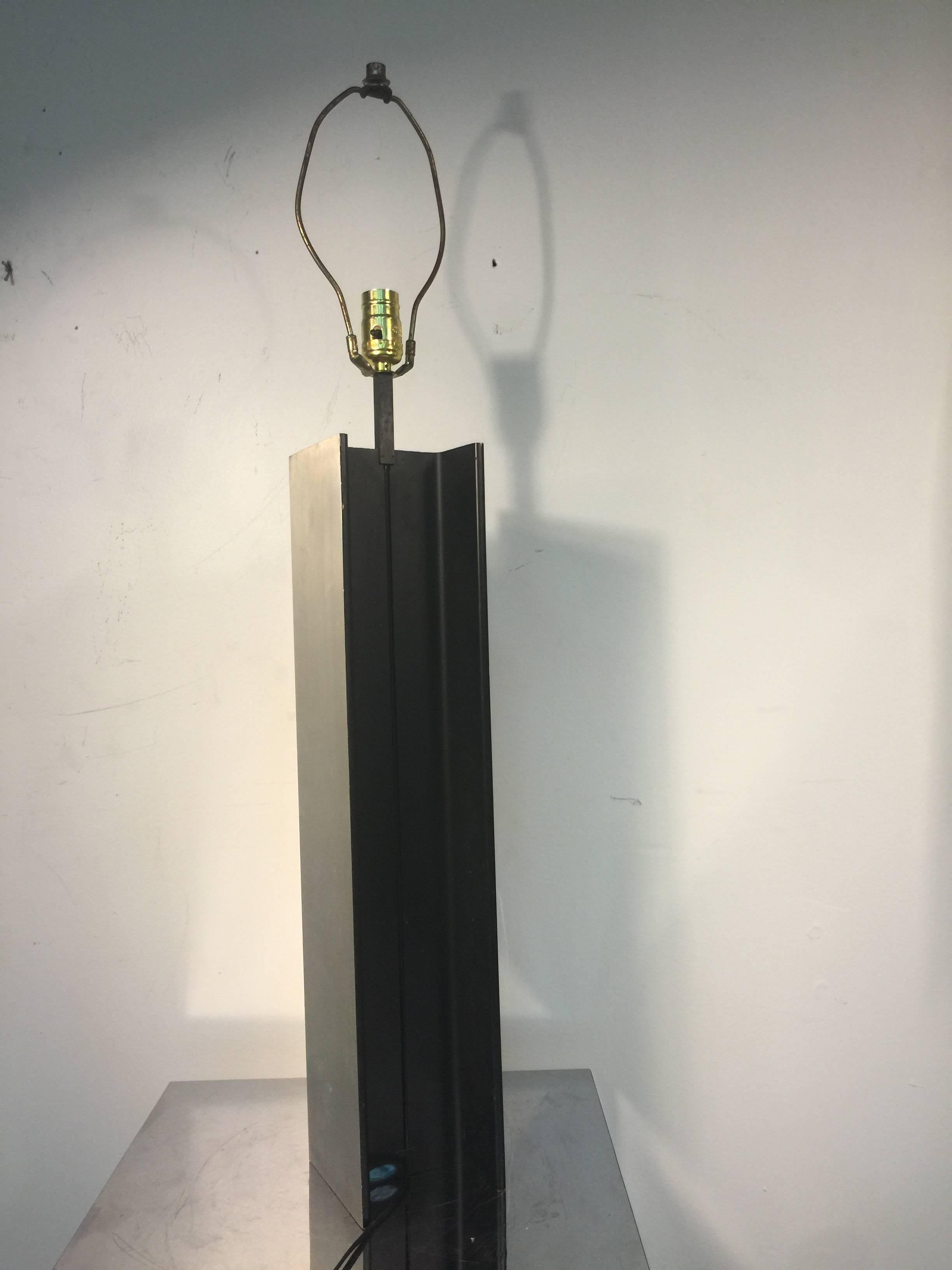 A striking I beam aluminum column table lamp by Laurel Lighting, circa 1970. Good vintage condition with age appropriate patina.
  
