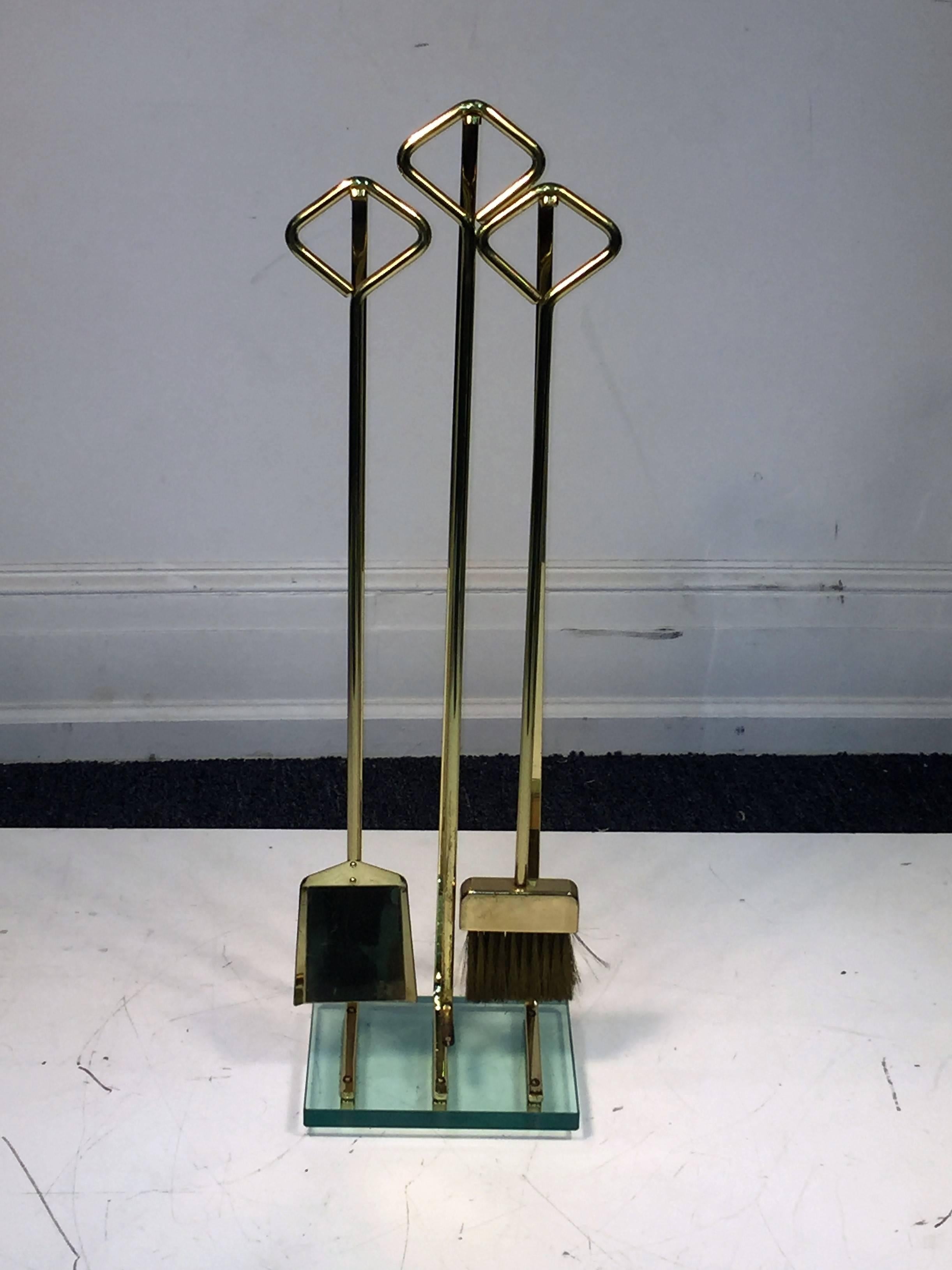 Great Fontana Arte Modernist Polished Goldtone Metal and Glass Firetools In Excellent Condition For Sale In Mount Penn, PA