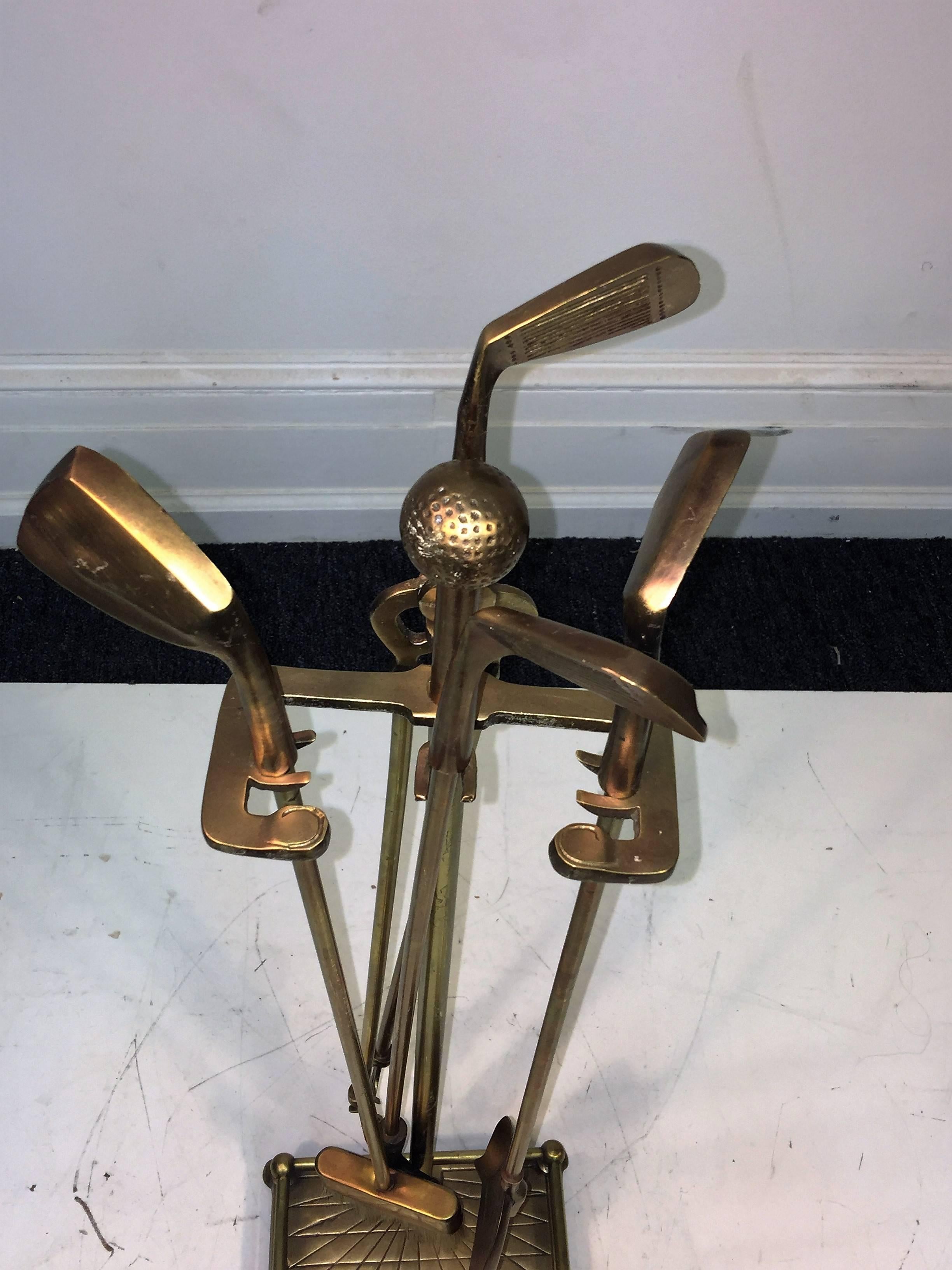 Bronzed metal golf handles fire tools-poker, tongs, shovel and brush
31