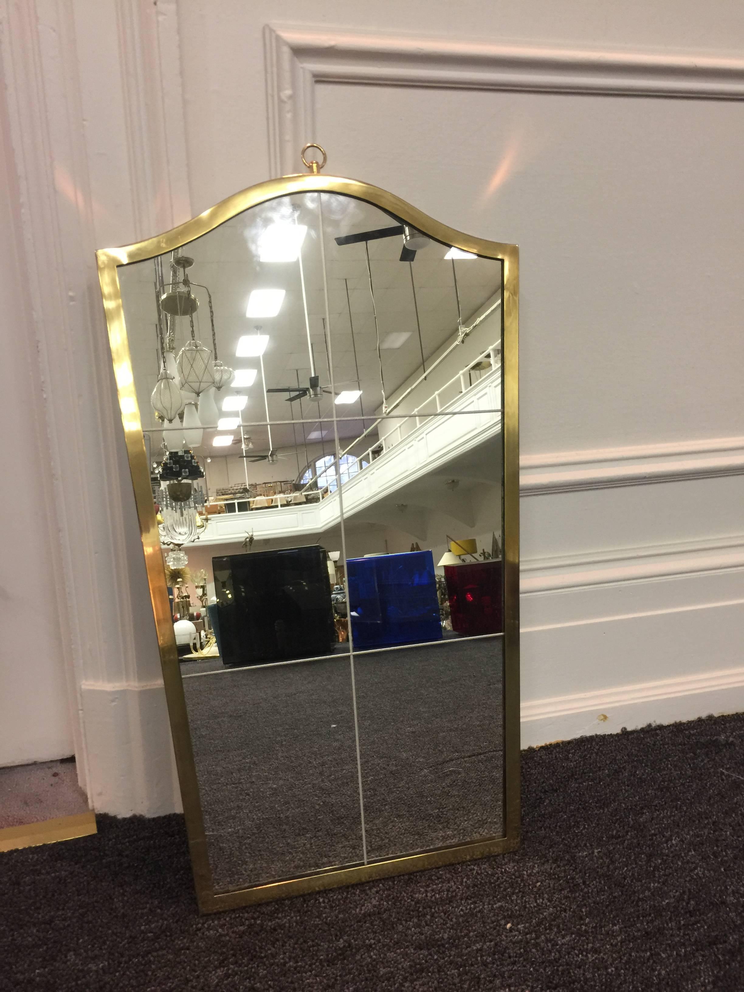 An exceptional etched glass French wall mirror with brass frame and unusual size, in the style of Maison Baguès, circa 1970.