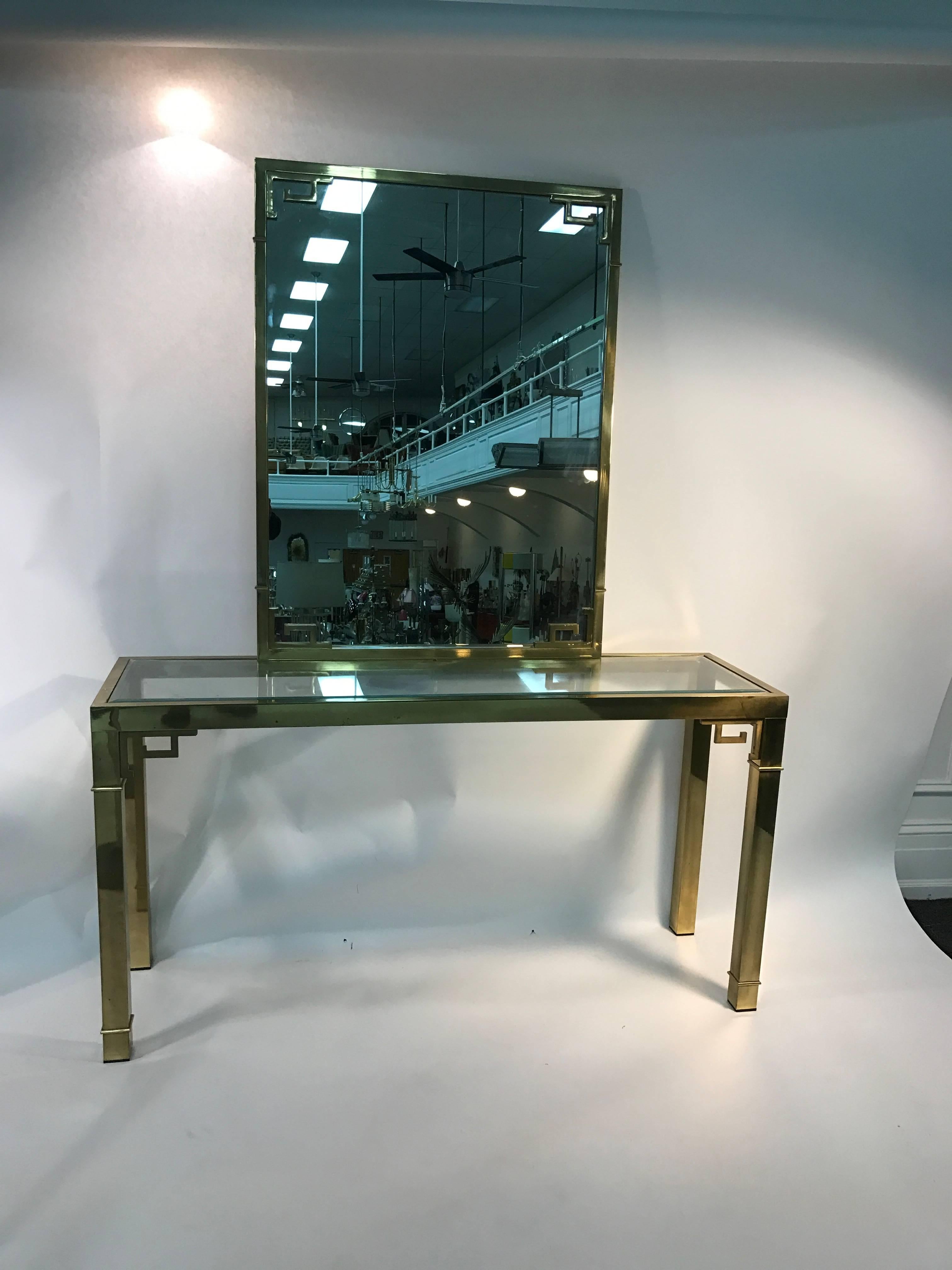 A stunning solid brass Italian mirror and console table with Greek key design. Magnificent stylish look, circa 1970. Good vintage condition.

 Measures: Mirror: 42.5