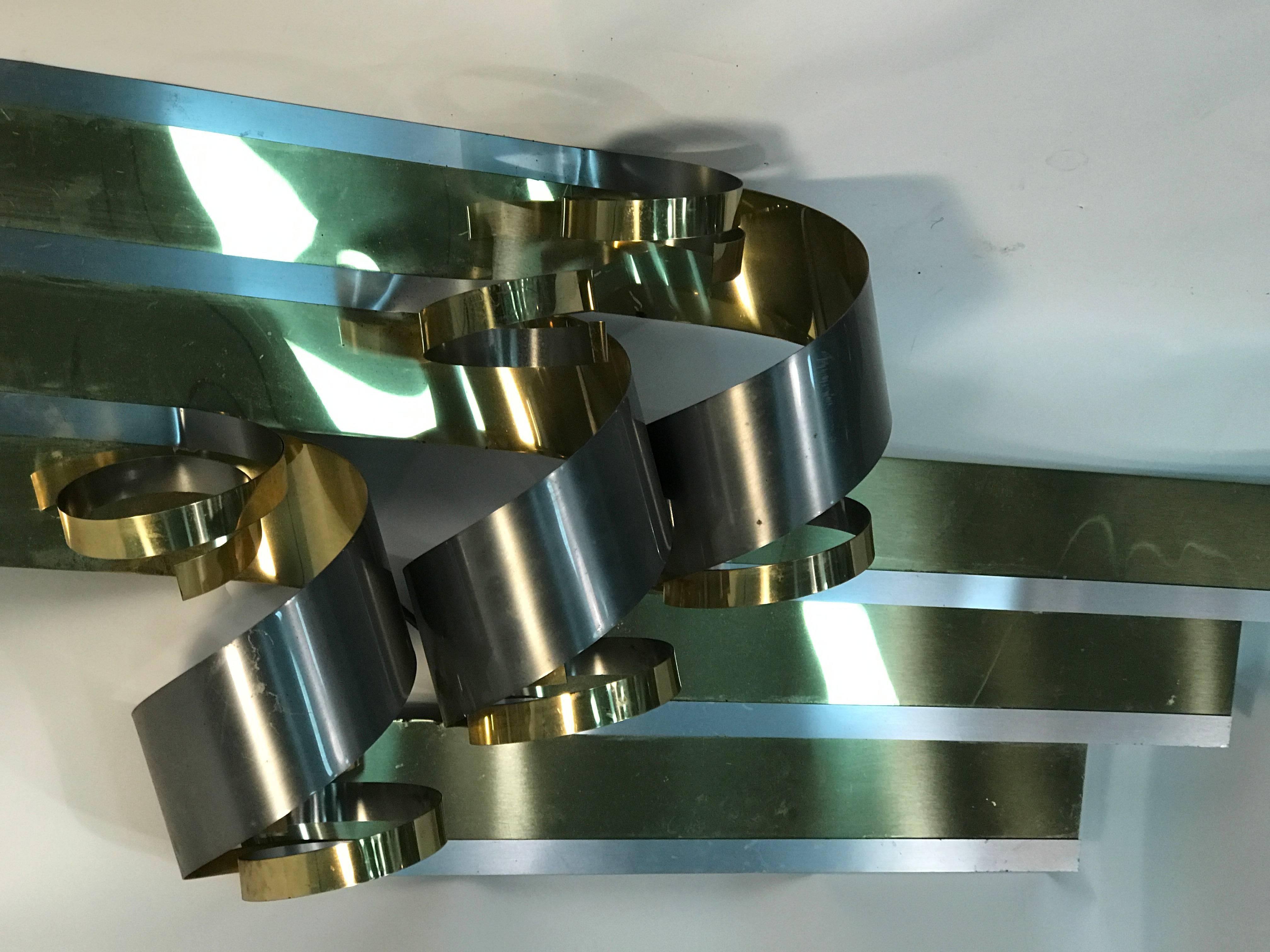 Magnificent Modernist Curtis Jere Ribbon Motif Wall Sculpture in Chrome & Brass In Good Condition For Sale In Mount Penn, PA