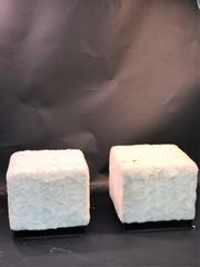 Pair of High End Bronzed Steel White Mink Ottomans in the Style of Karl Springer