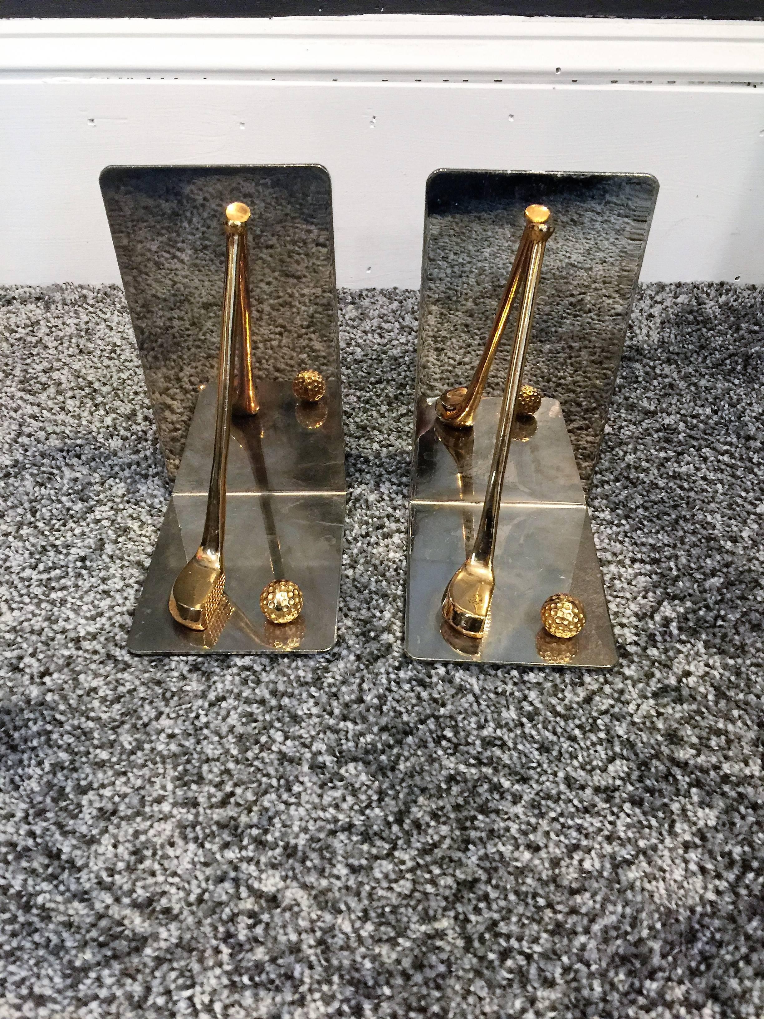 Striking pair of polished nickelled steel and cast brass ball and club bookends well designed and made in the style of Gucci.