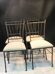 Exceptional Suite of Four Sculptural Iron Chairs in the Manner of Giacometti