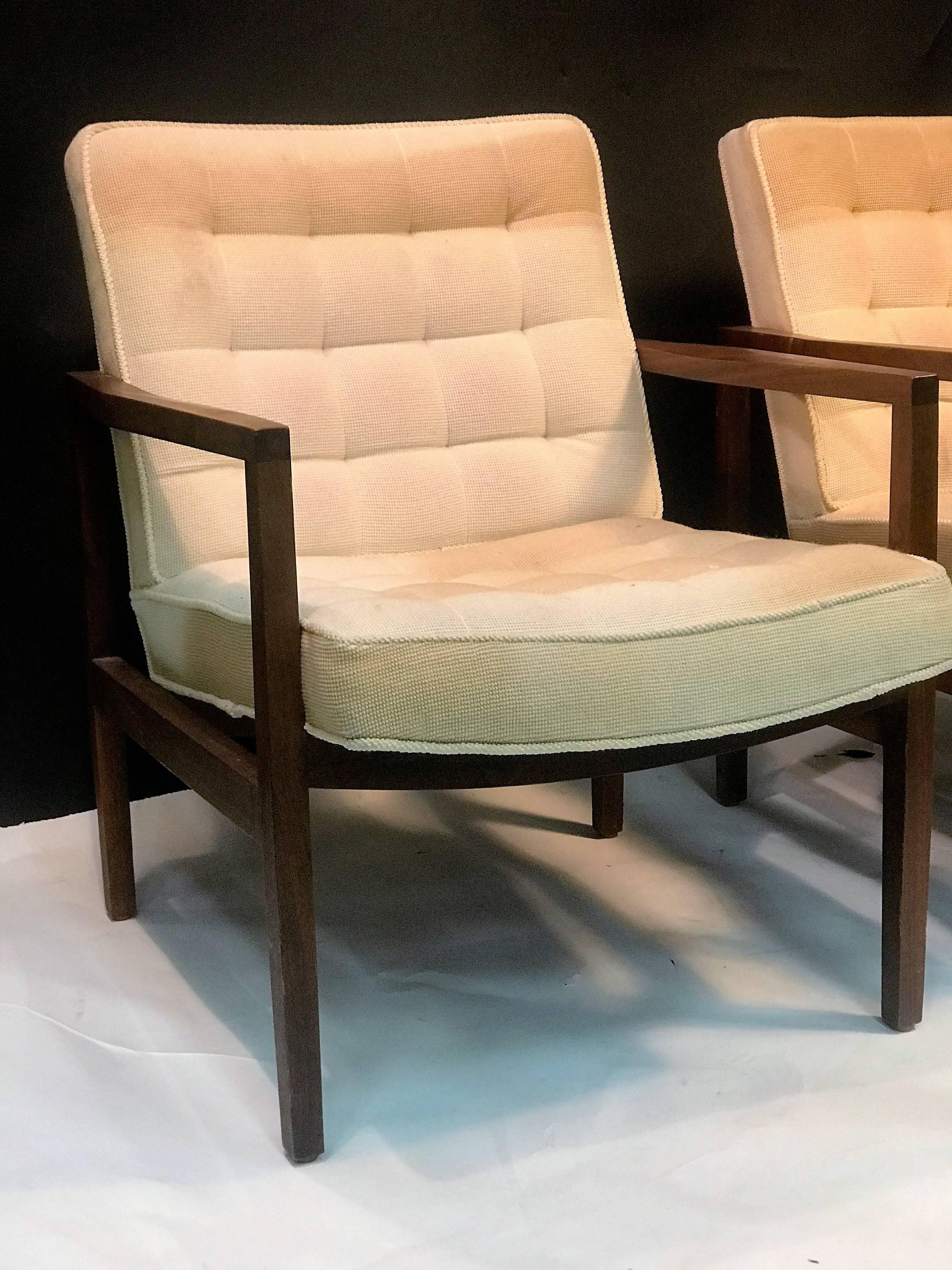 Pair of beautiful sculpted wood armchairs with original cream tufted fabric backs and seats. Great Mid-Century design attributed to Edward Wormley for Dunbar.