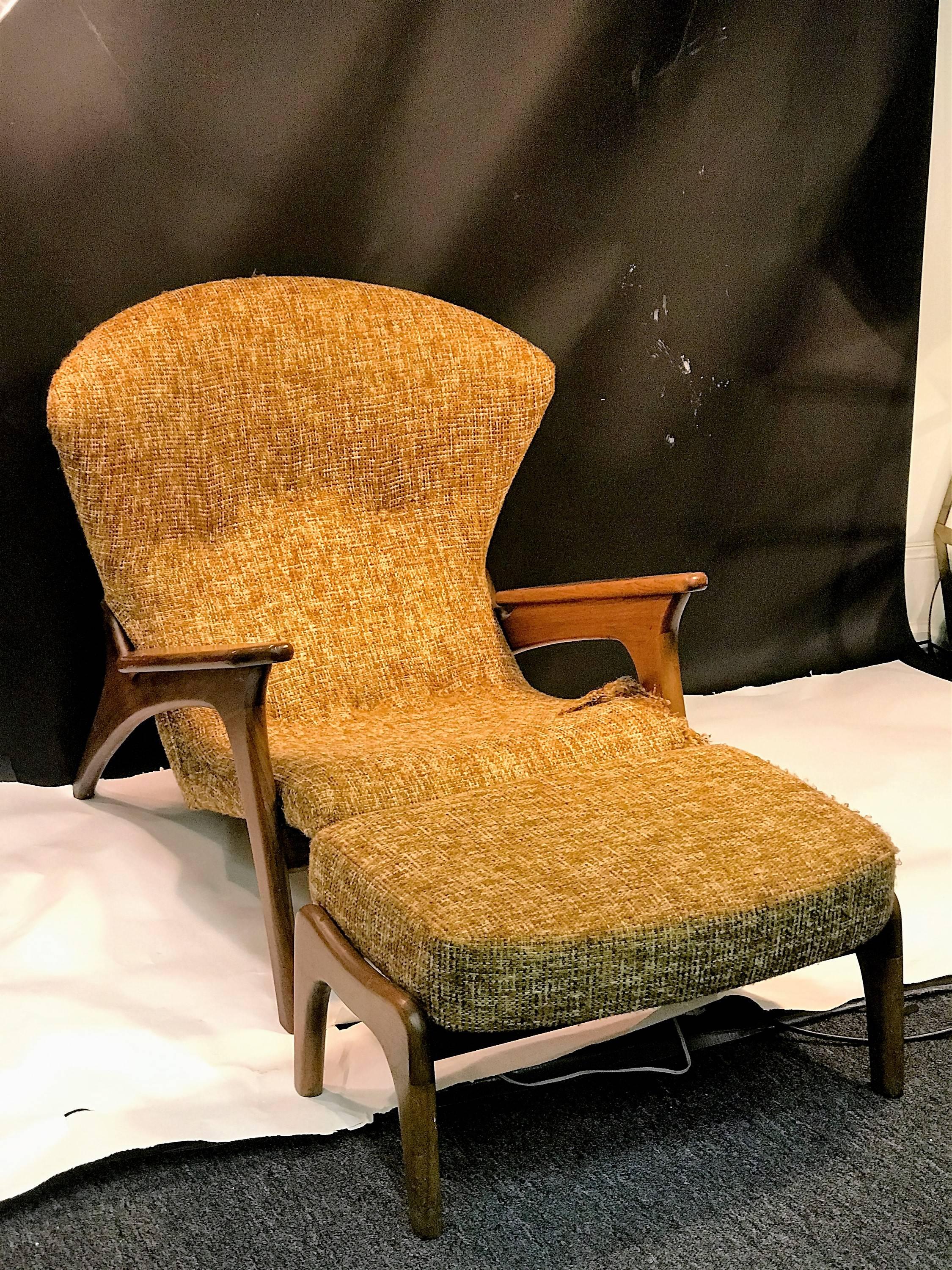 Fantastic Mid-Century iconic design of a highly sculptural chair of teak designed by Adrian Pearsall in original textured yellow fabric with ottoman. Interesting high end chair and ottoman for your living room.