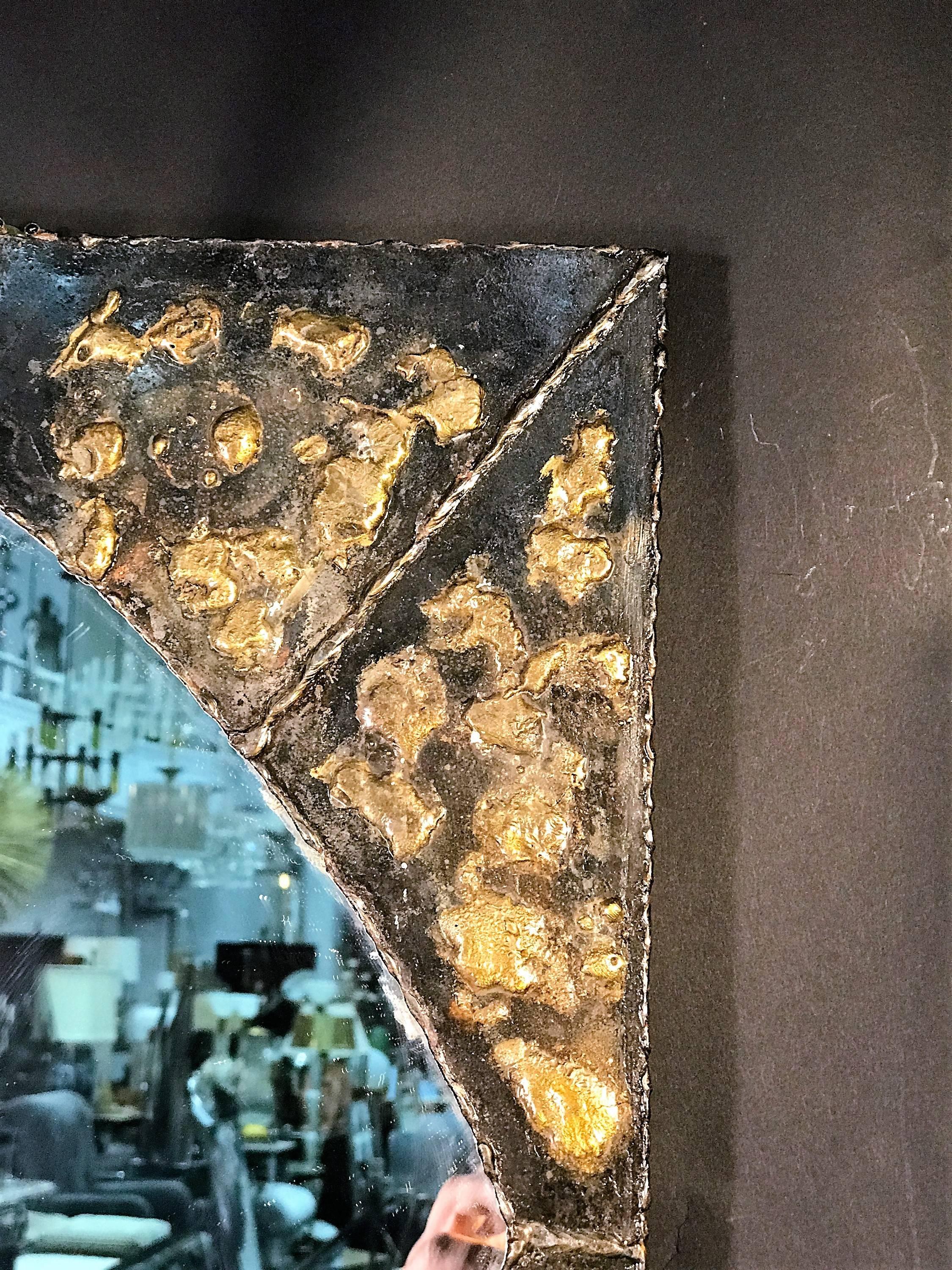 American Textured Brutalist Elongated Diamond Shaped Mirror in the Manner of Paul Evans For Sale