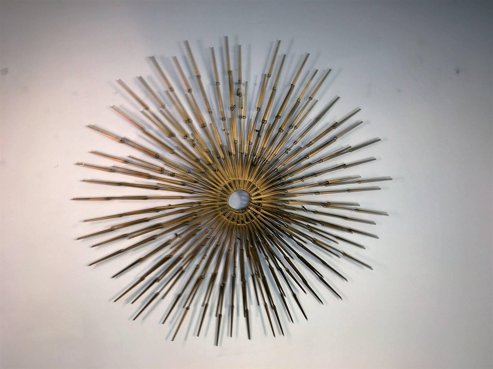 Great 1970s gold enamel iron spike form multi layered starburst with open circle center. Well constructed and hand welded, sculpted by a Brutalist sculpture artist.
 