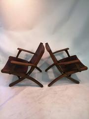 Great Pair of Hans Wegner Style Saddle Tooled Leather Folding Chairs and Ottoman