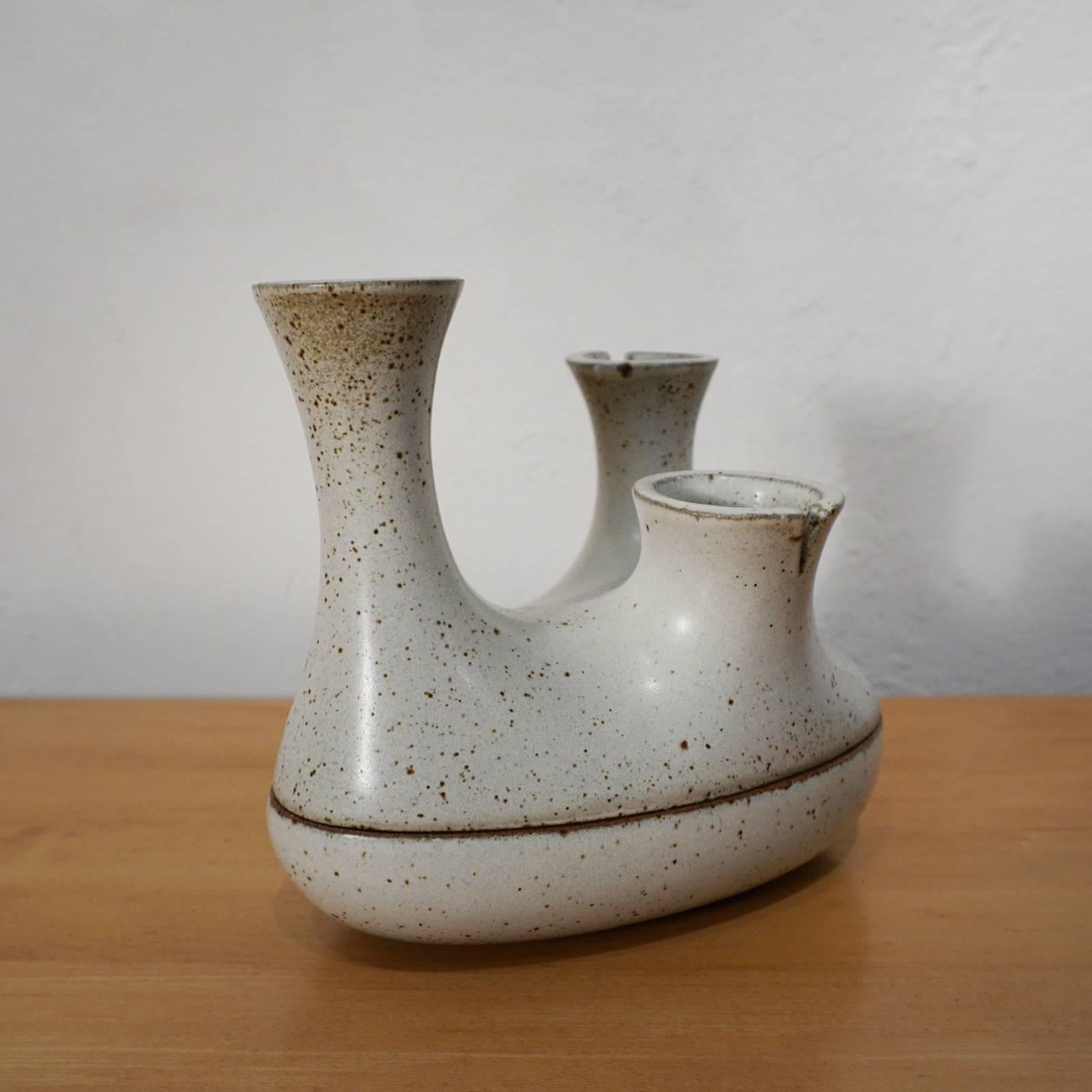 Uncommon two-piece sculptural form from David Cressey's Pro/Artisan line for Architectural Pottery. The form was designed by Douglas Deeds. 

From the Architectural Pottery Pro/Artisan catalog:
