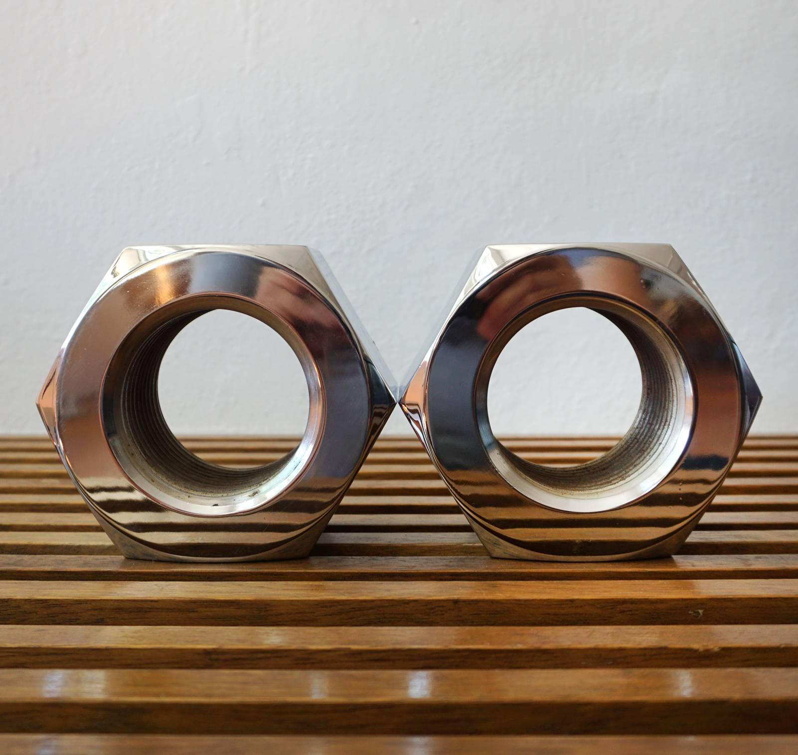 A pair of giant polished nickel nut bookends designed by Bill Curry for Design Line, 1960s.