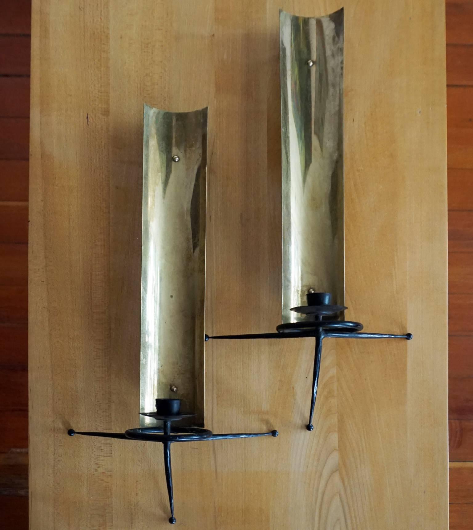 Pair of brass and iron wall candle sconce. Designed by Tony Paul for his Woodlin Hall 