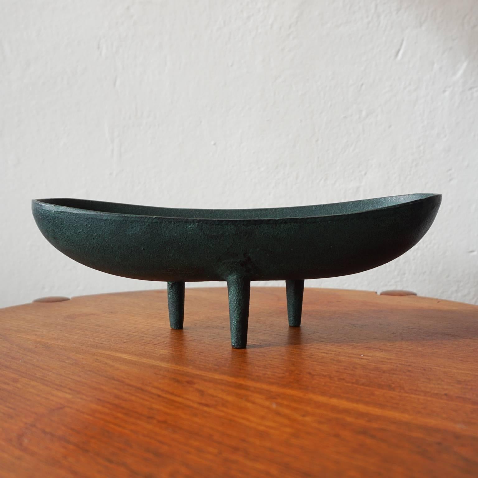 Mid-Century solid cast iron Ikebana vessel from Japan. There are three legs. Unsigned.