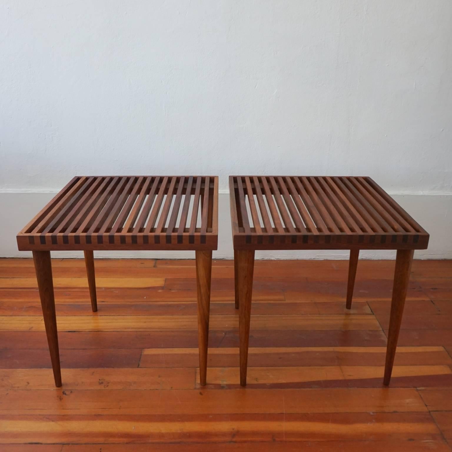 A pair of slatted side tables with tapered legs by Mel Smilow. Great construction details. Can also be stacked. 1950s.