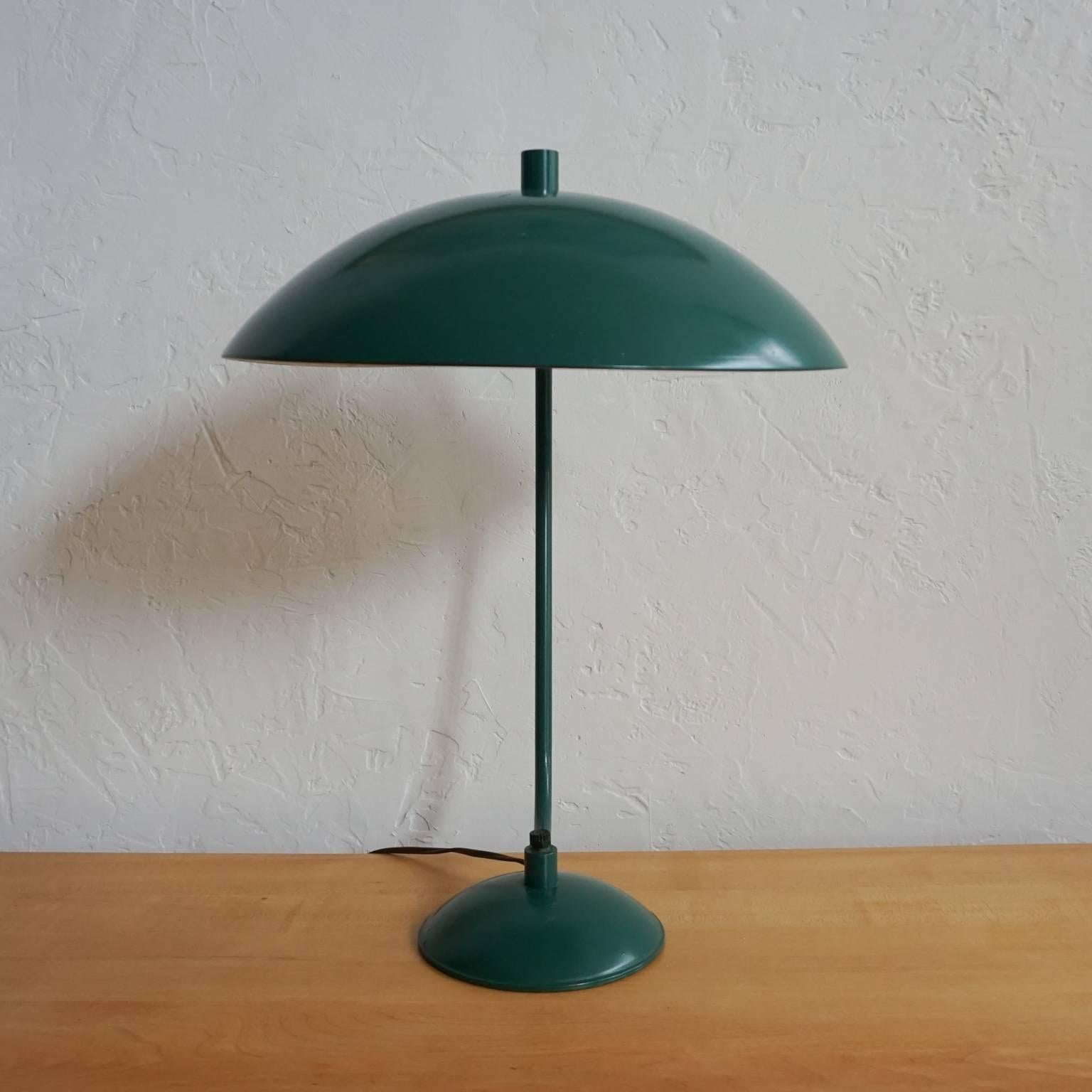 Enameled green steel desk lamp by Kurt Versen.