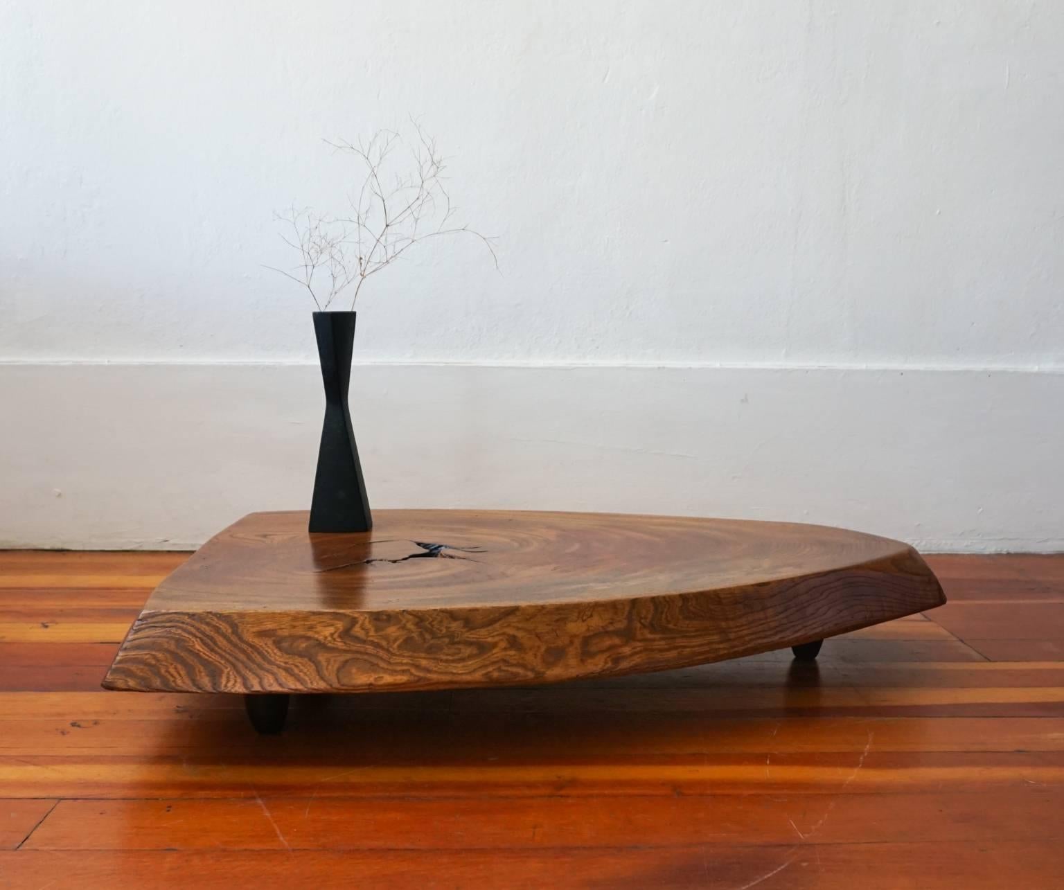 Thick solid carved slab table or sculpture pedestal constructed of Japanes Tochi wood, Japan, 1950s.