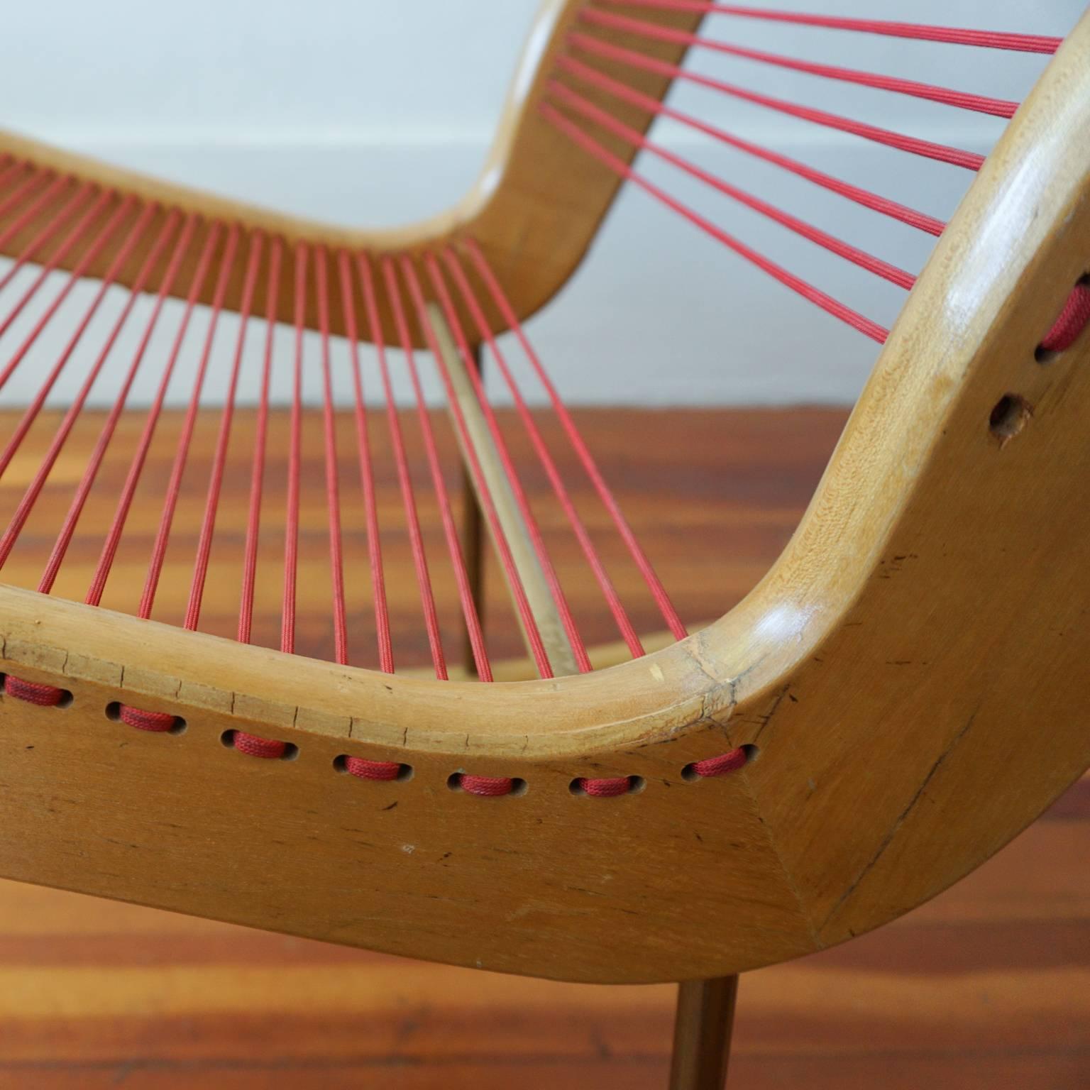Brass Modernist String Wood and Iron Rocking Chair by Carl Koch