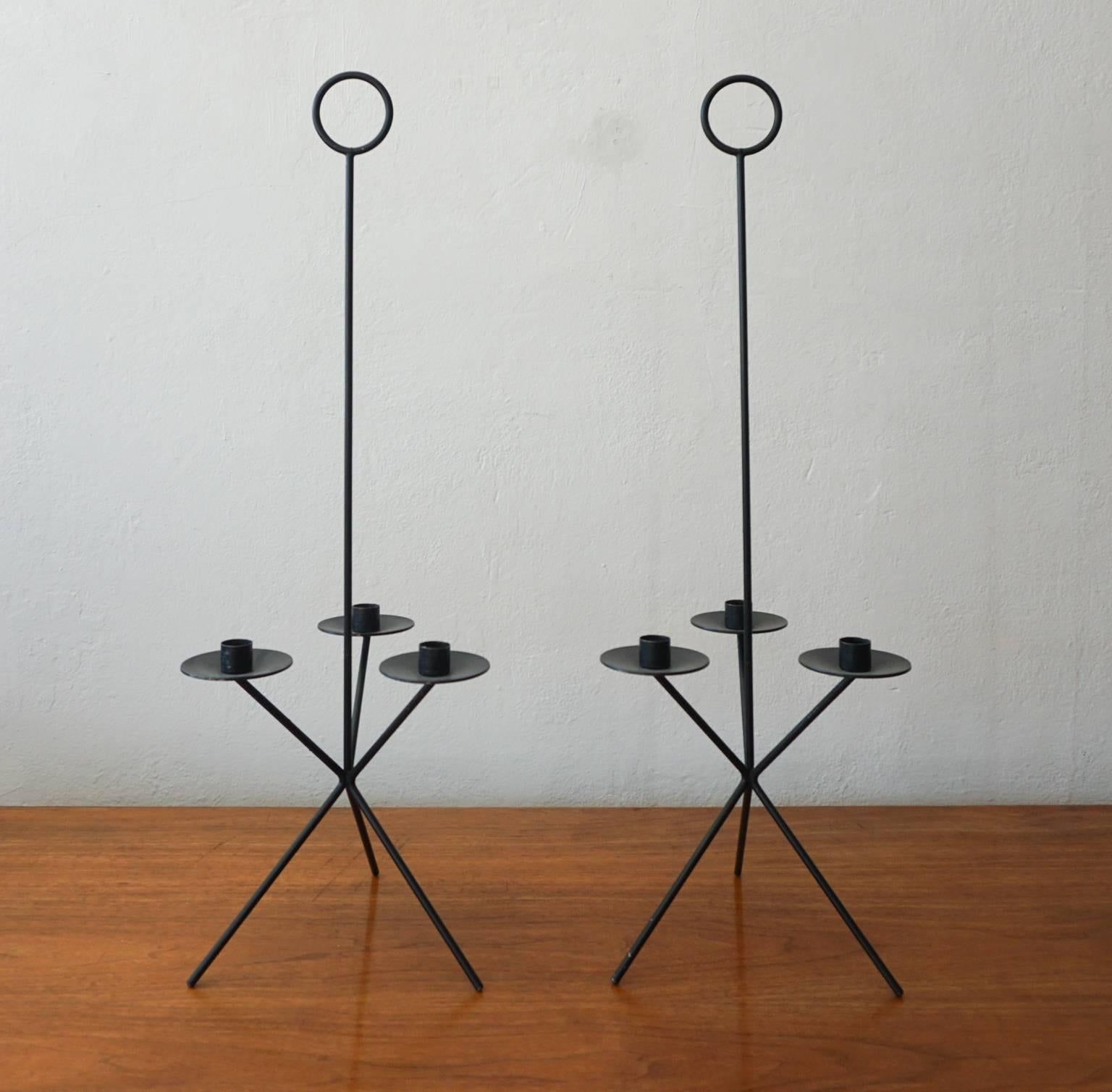 Pair of 1950s iron candleholders. Well-made and original finish.