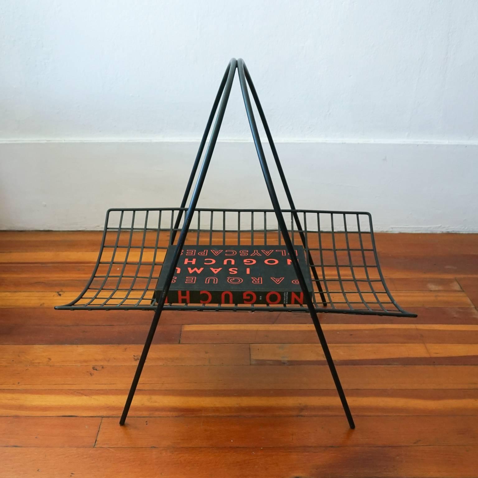 1950s iron log holder or catch all.