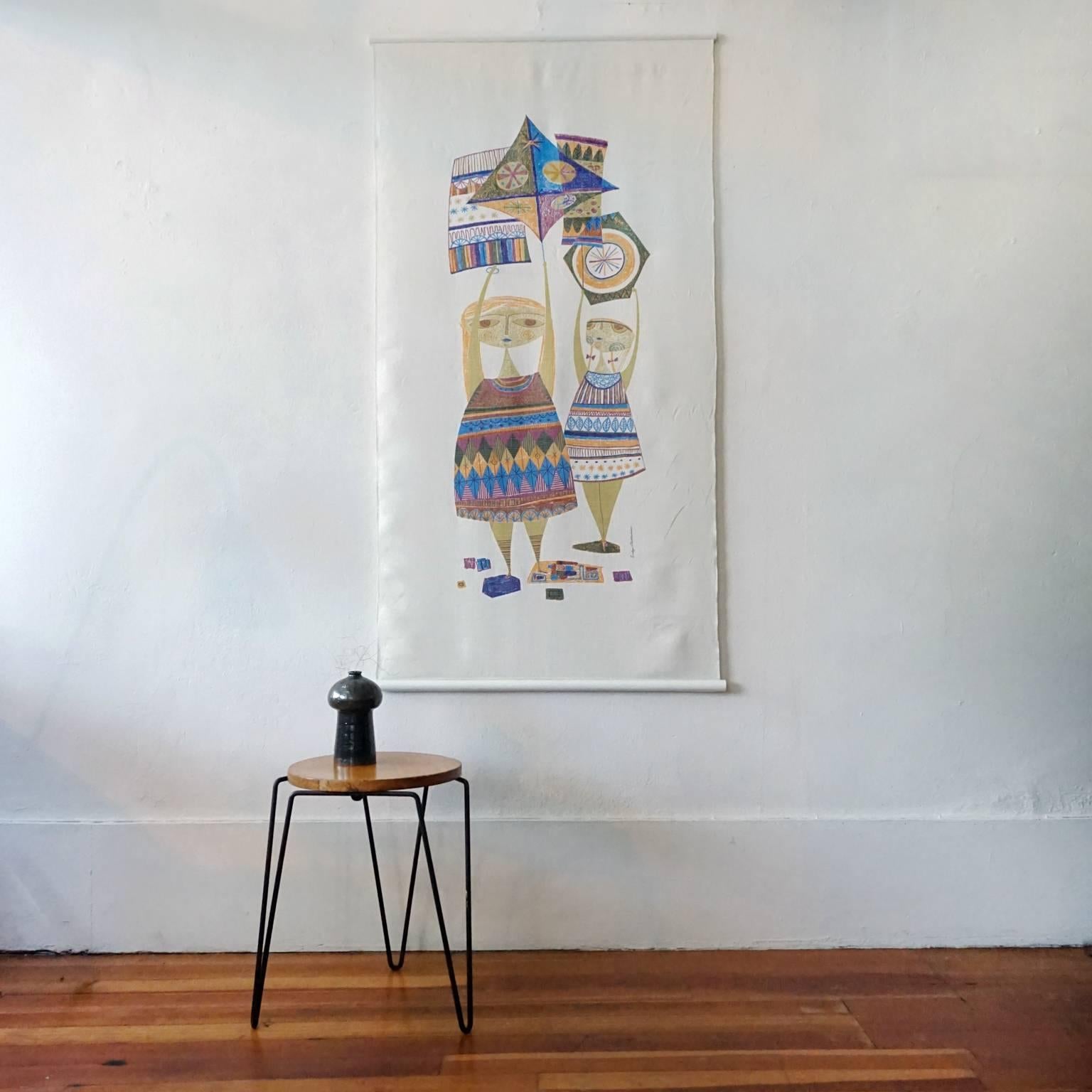 Kites by Evelyn Ackerman was the first wall hanging textile she designed. It was featured on the cover of the Los Angeles Times Home magazine in 1958. Silkscreen on linen, with dowels on the top and bottom.