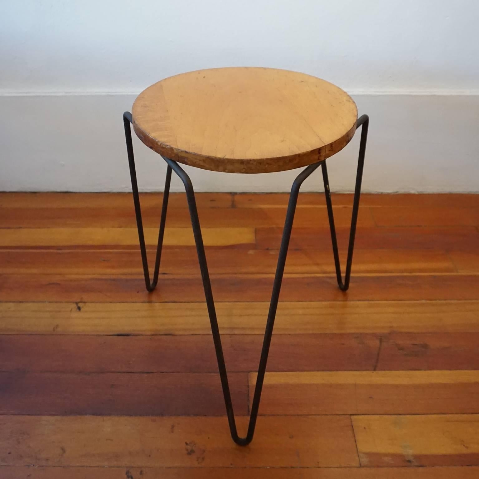 Side table or stool by Los Angeles-based company Inco, 1950s. Maple top and iron legs.