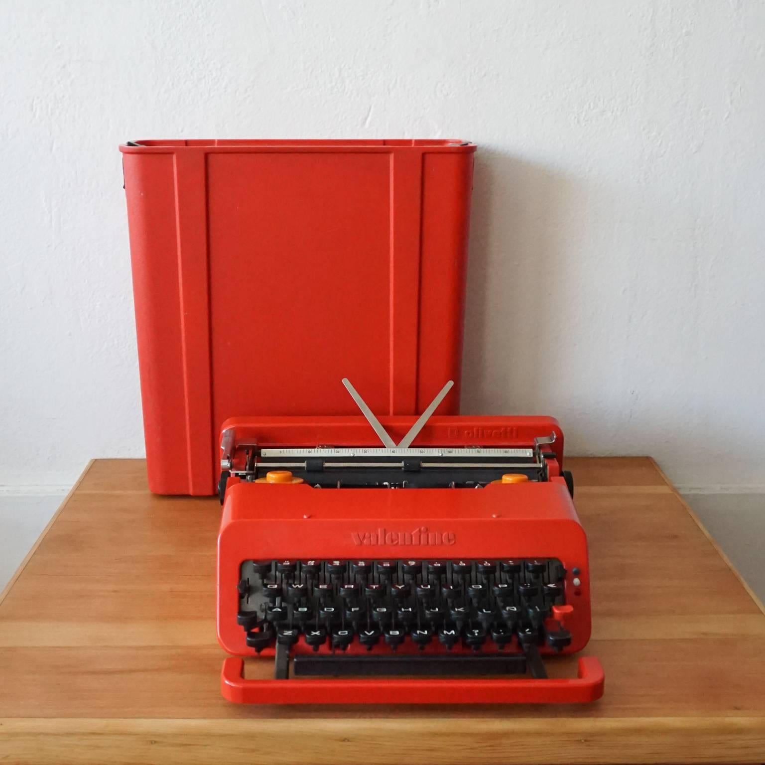 Olivetti Valentine Typewriter by Ettore Sottsass Jr. and Perry King, 1968. Incredibly good condition, with original case and rubber straps. Freshly-serviced with new ribbon. Works perfectly. 

This is the less often seen Spanish version with