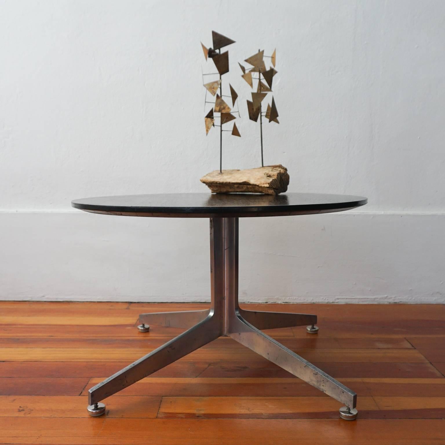 Designed by Ward Bennett for Lehigh Furniture Company. From Bennett's Column X Collection, which was launched in 1959. Solid aluminum base and wood top with black satin finish.