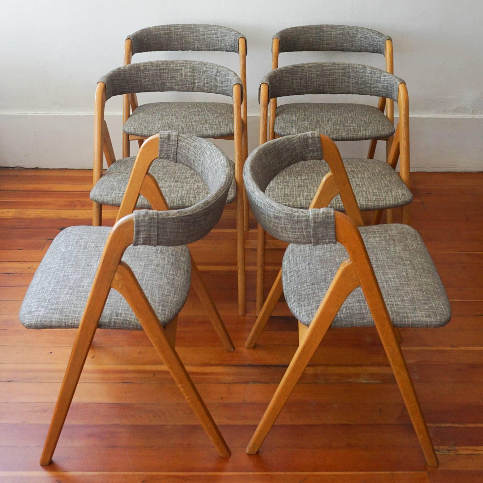 Set of six dining chairs in ashwood. Great lines and construction. Made in Japan, 1950s.