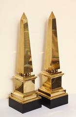 Pair of 1970s Tall Brass Obelisks Supported on Black Painted Plinths