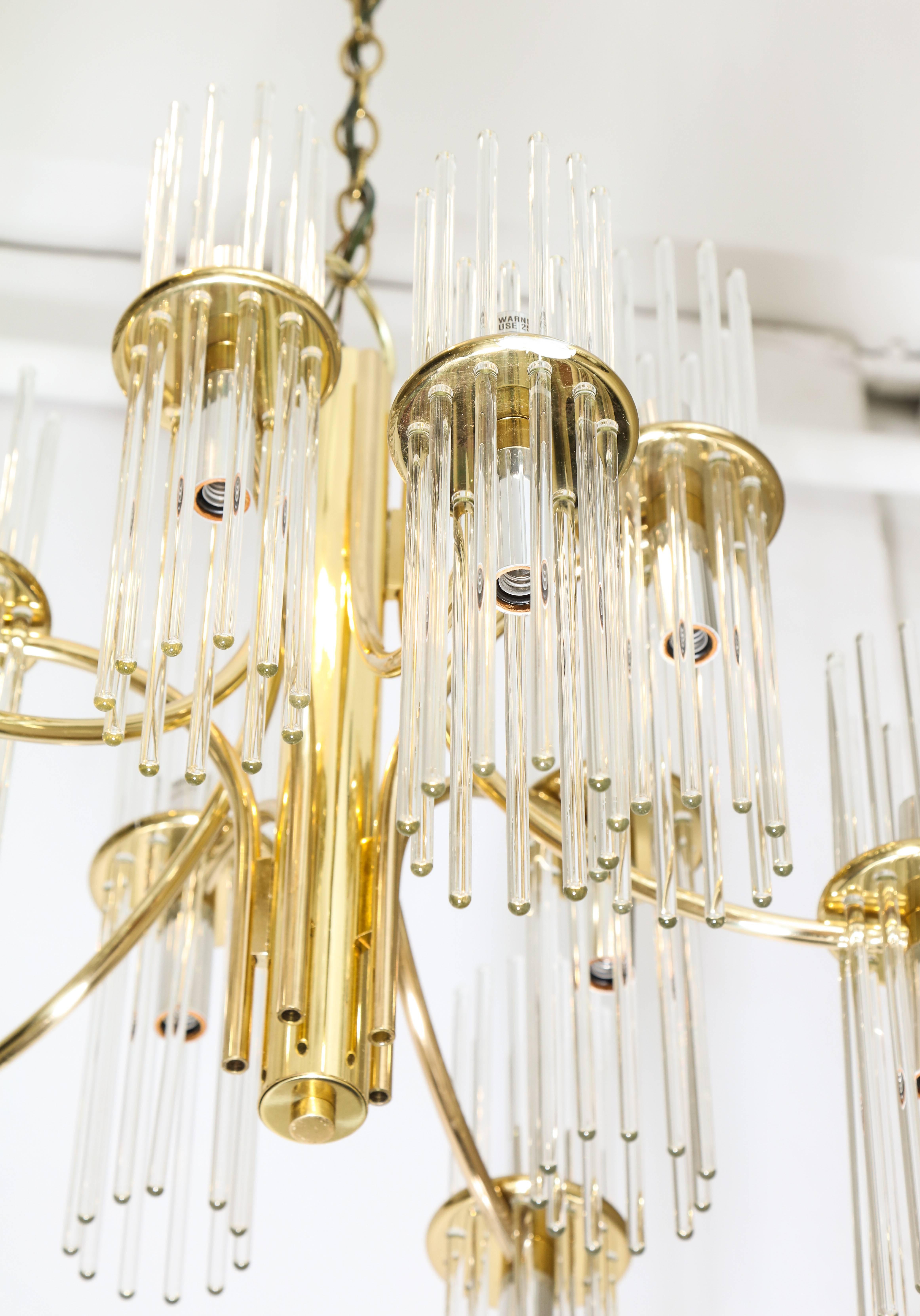 Italian 1970s Brass Nine-Arm Chandelier with Glass Prisms In Excellent Condition In New York, NY