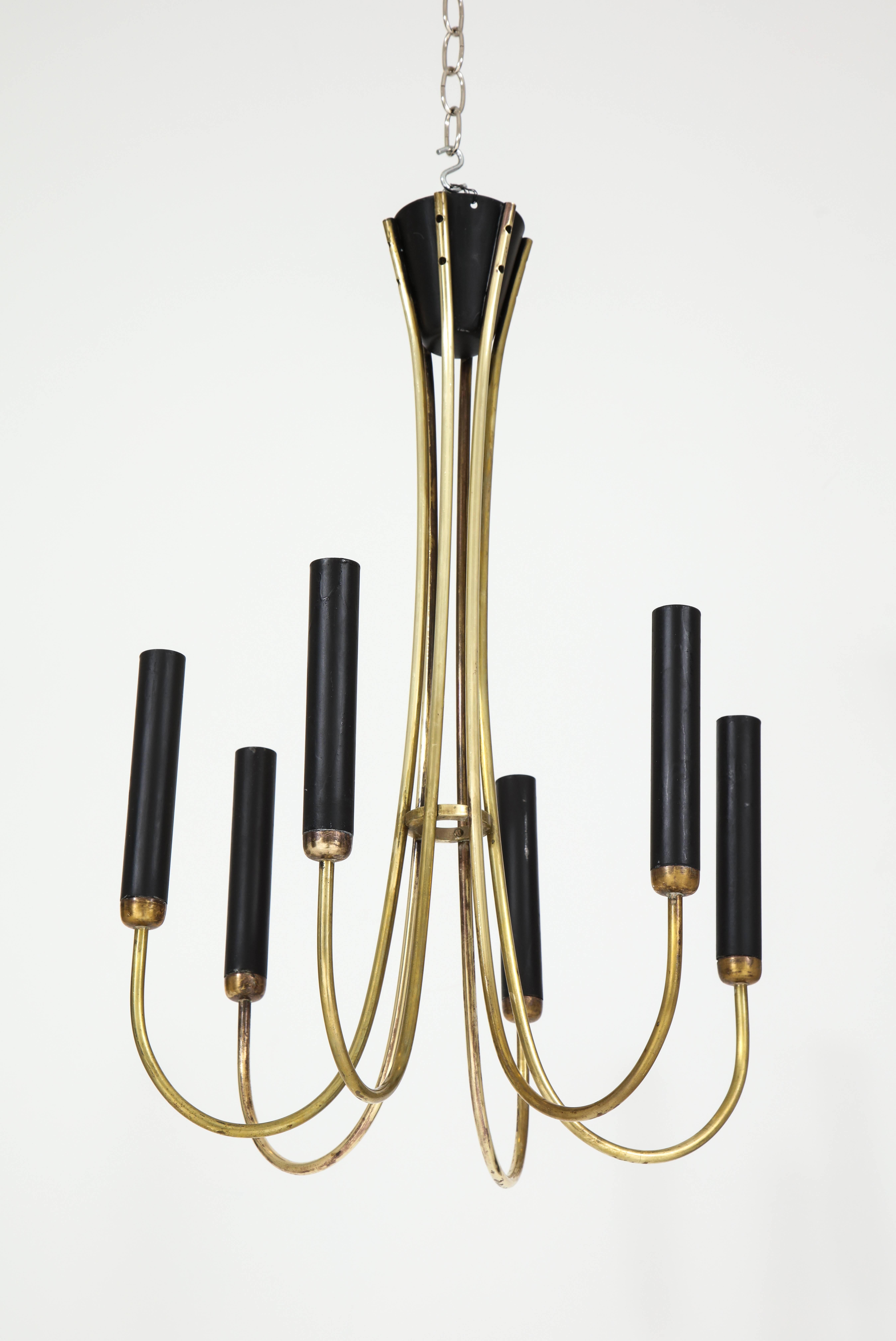 An Italian 1970s brass chandelier having six arms with black metal tubular sleeves,
Italy, circa 1970.
Size: 28