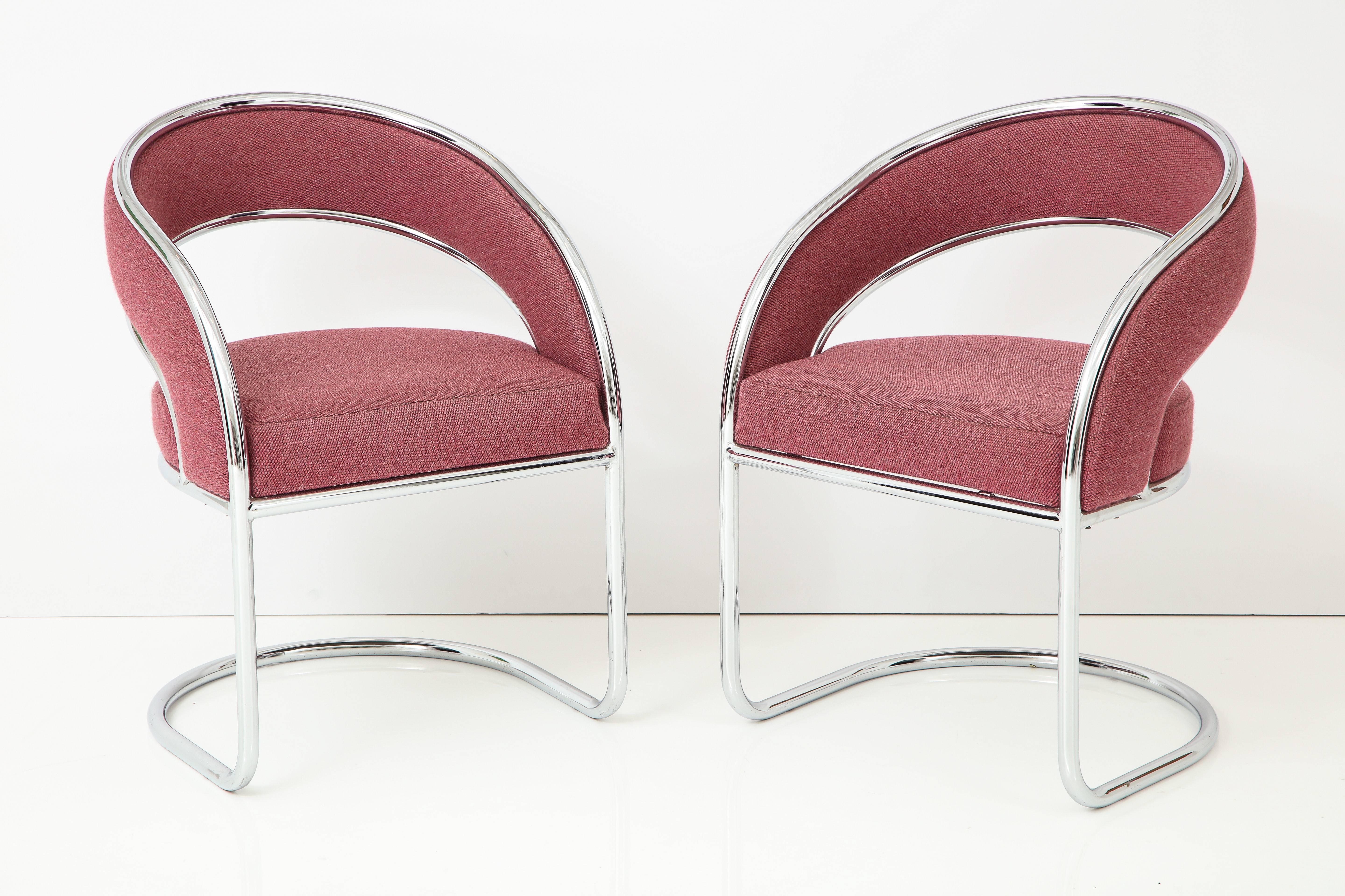 A Classic pair of 1970s chrome cantilever armchairs; upholstered in original mauve wool cotton.
American, circa 1970
Size: 31 1/2