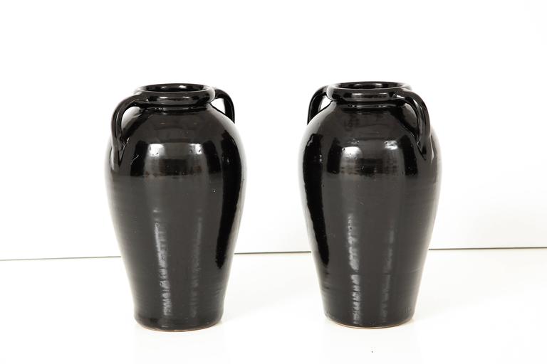 Pair of Tall Black Glazed Stone Ware Vases or Jars with Handles For